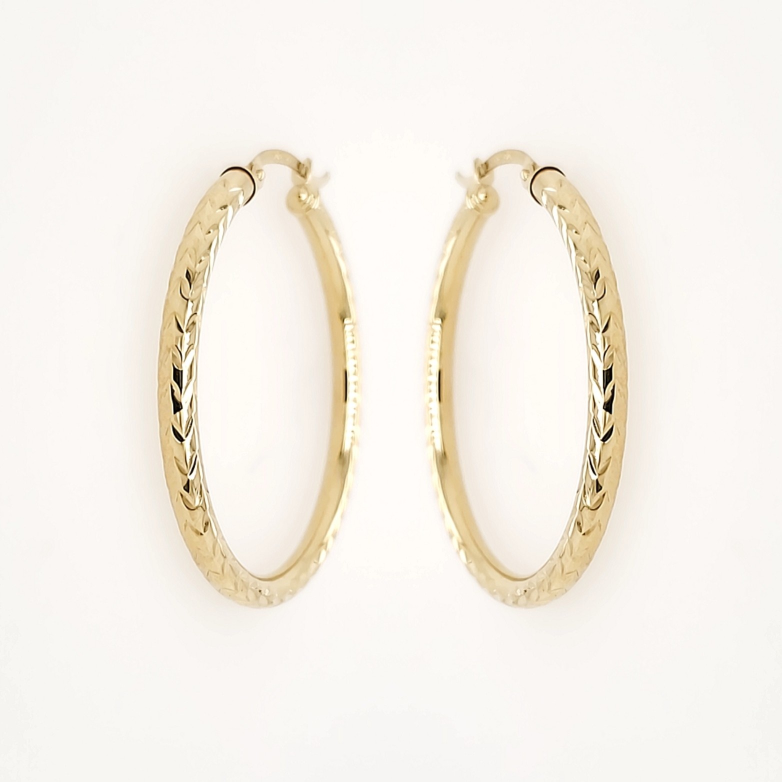 30555 14K YELLOW GOLD 1.45" 3MM SPIGA DESIGN DIAMOND CUT HOOPS 30555 14K YELLOW GOLD 1.45" 3MM SPIGA DESIGN DIAMOND CUT HOOPS