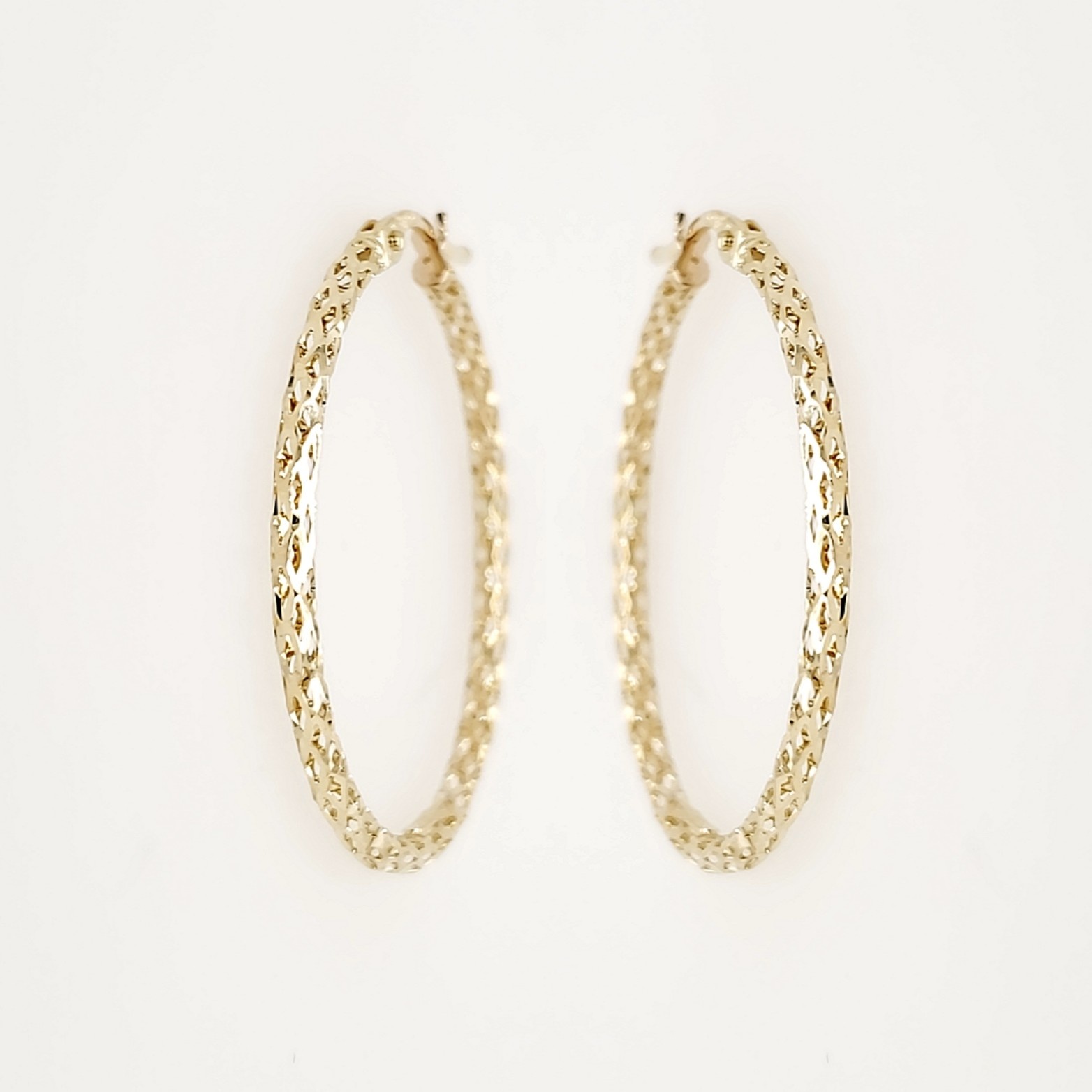 30027 14K 1.25" YELLOW GOLD OPEN-CUT HIGH POLISHED HOOPS