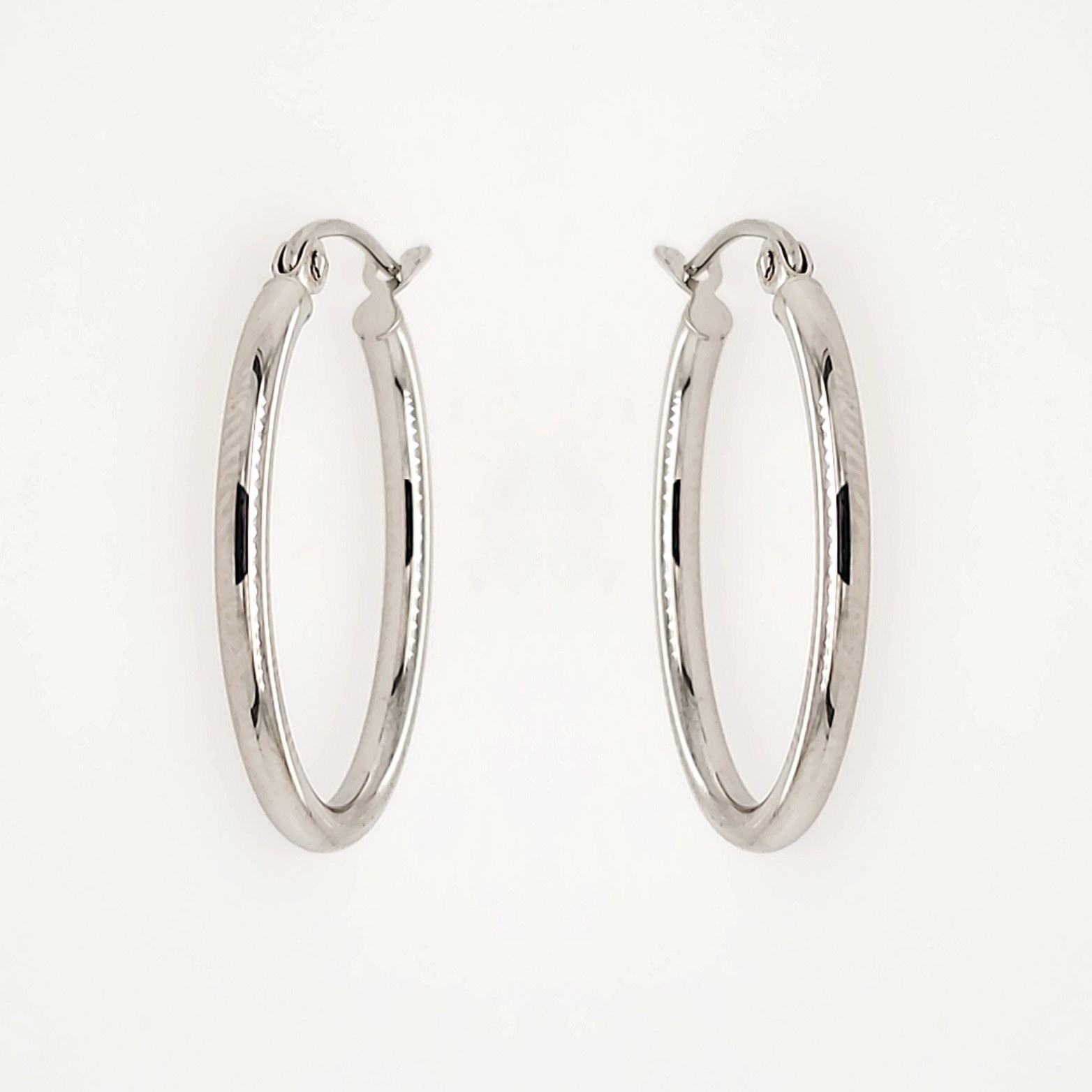 30867 14K WHITE GOLD 2MM HIGH POLISH TUBE OVAL HOOP EARRINGS