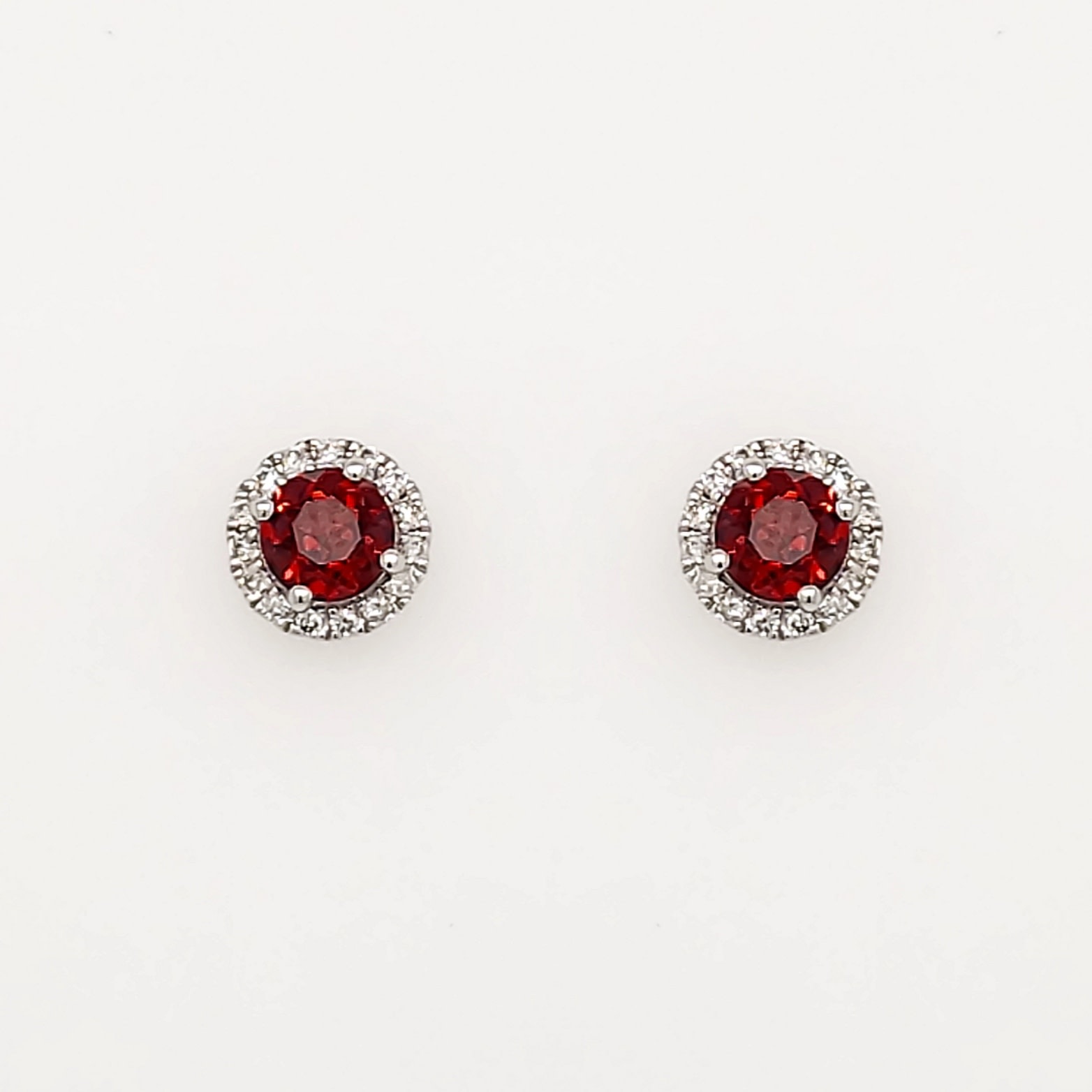 30872 14K WHITE GOLD .12CTW DIAMOND HALO ROUND GARNET STUDS
