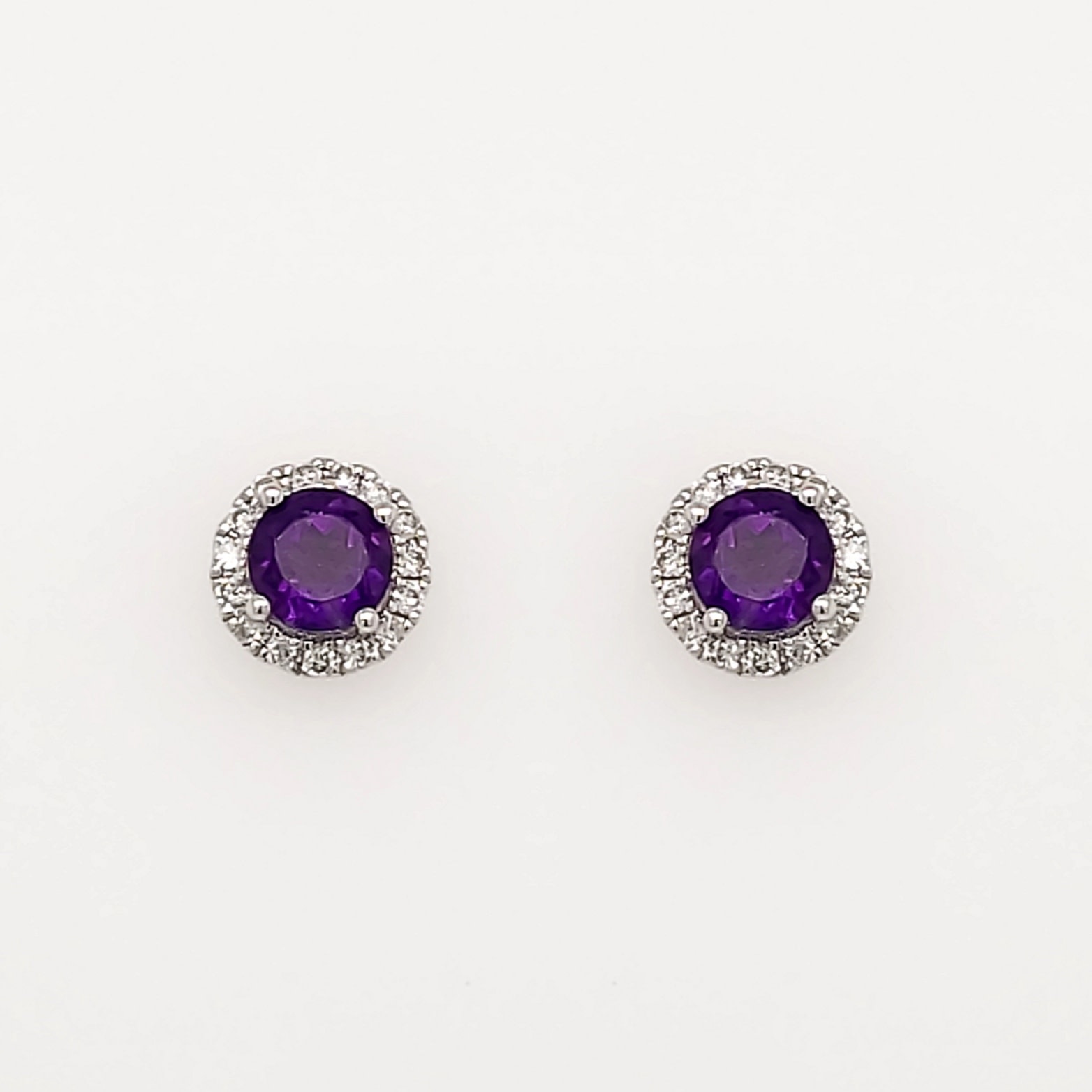 30873 14K WHITE GOLD .12CTW DIAMOND HALO ROUND AMETHYST STUDS 30873 14K WHITE GOLD .12CTW DIAMOND HALO ROUND AMETHYST STUDS