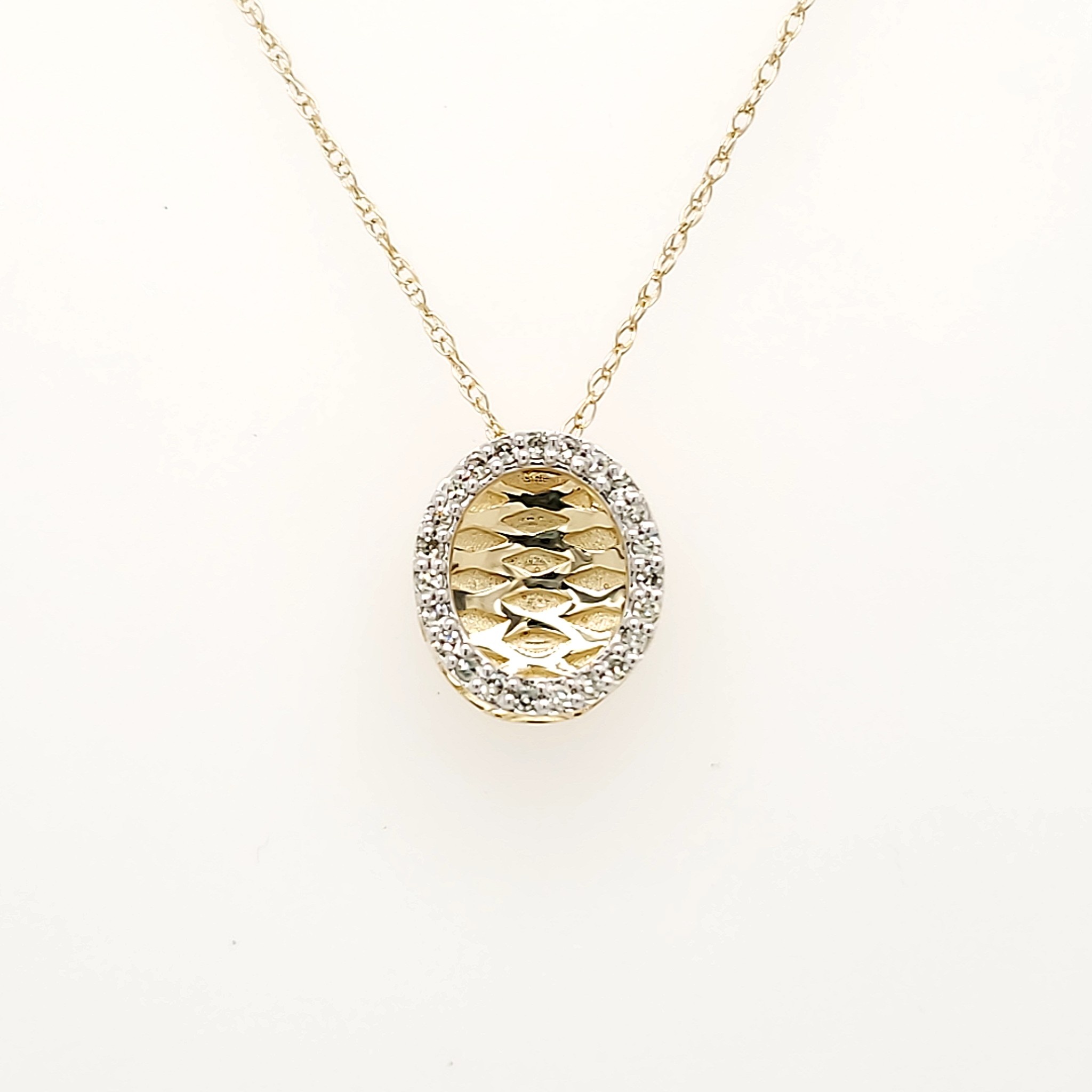 70177 14K YELLOW GOLD .10CTW DIAMOND OPEN OVAL HIGH POLISH PENDANT NECKLACE