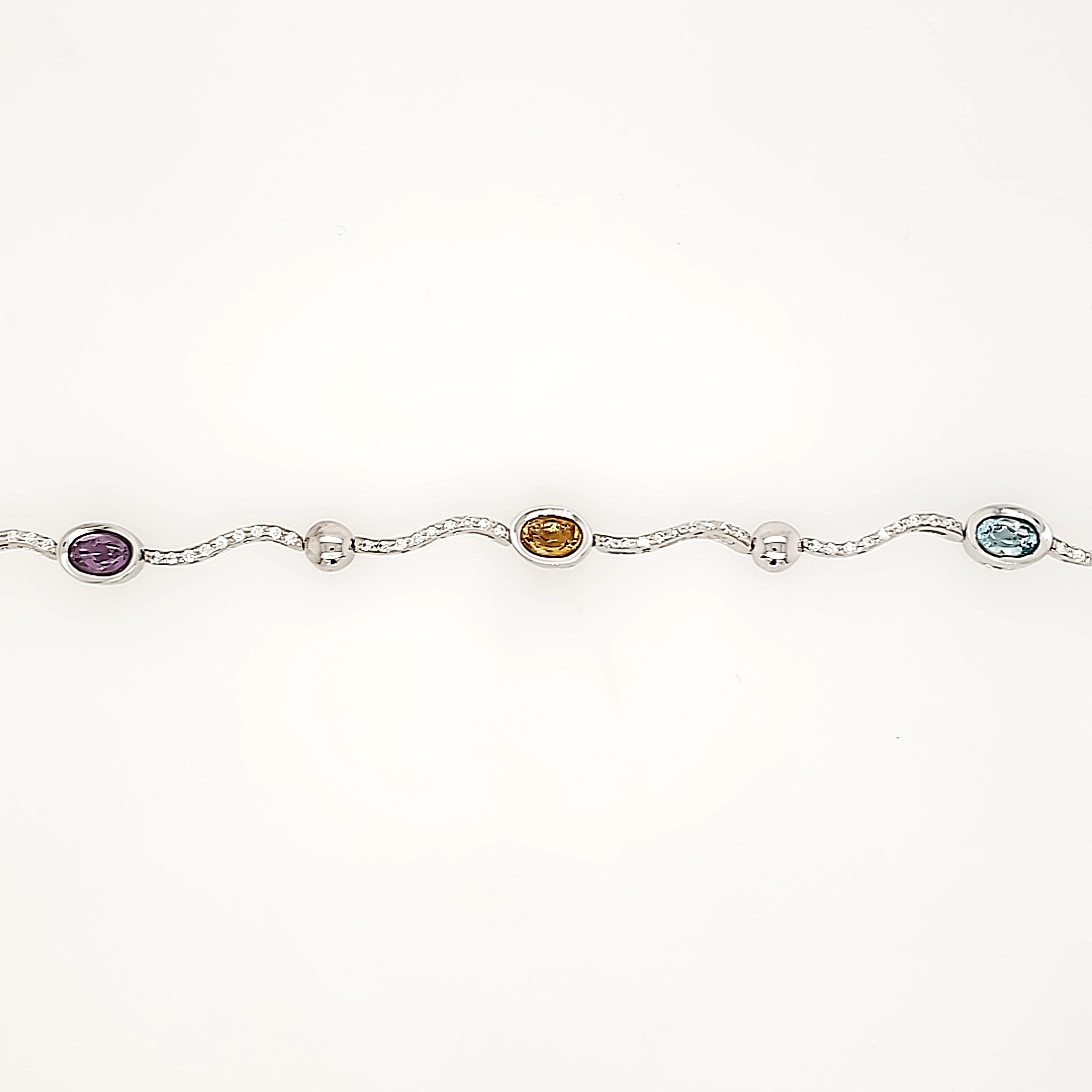 20176 14K WHITE GOLD MULTIGEMSTONE BEZEL SET WAVE STYLE BRACELET 20176 14K WHITE GOLD MULTIGEMSTONE BEZEL SET WAVE STYLE BRACELET