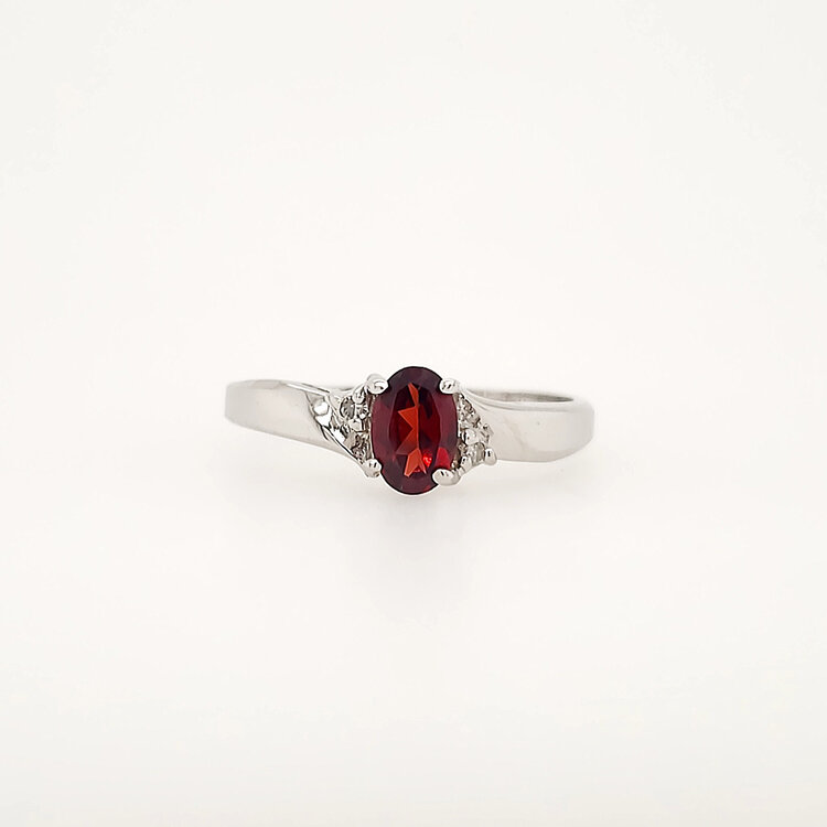 40417  10K WHITE GOLD OVAL GARNET WITH DIAMOND ACCENTS LADIES RING