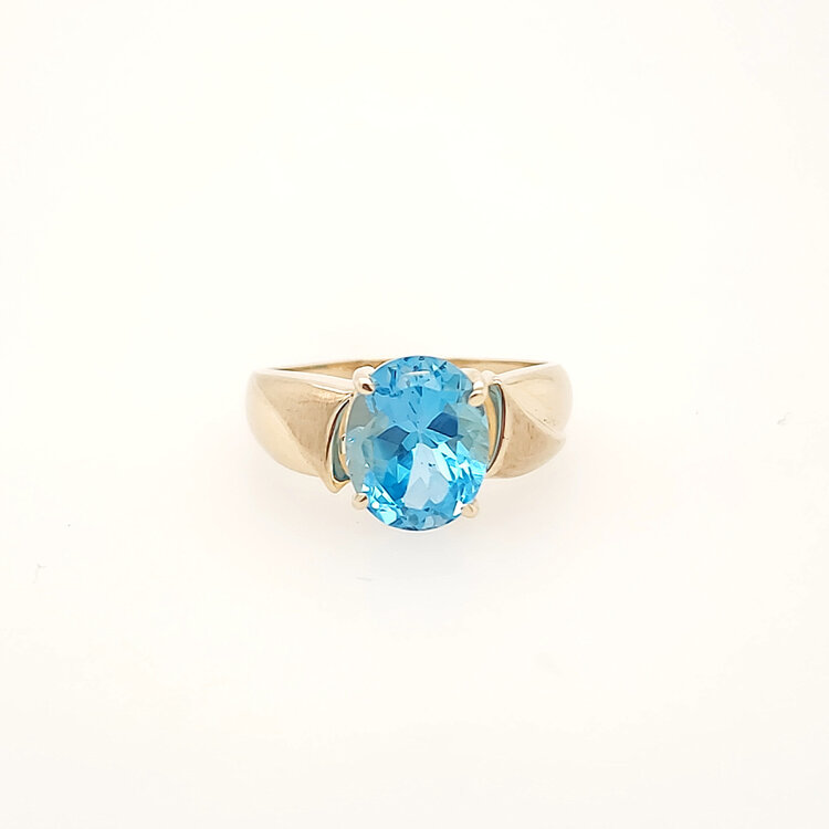 40466 10K YELLOW GOLD OVAL BLUE TOPAZ LADIES  RING