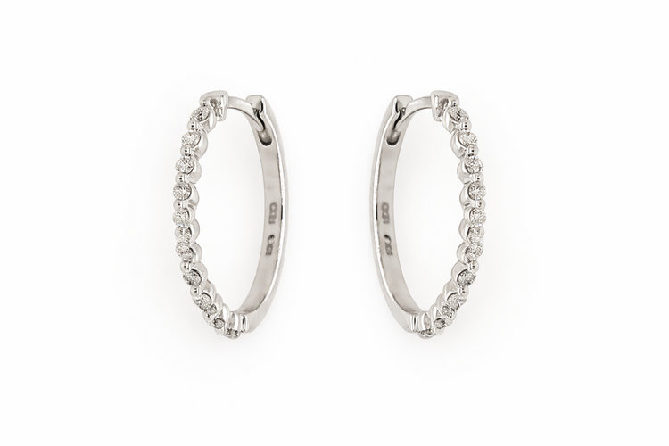 31595 10K WHITE GOLD .25CTW DIAMOND SHRAED PRONG OVAL HUGGIES