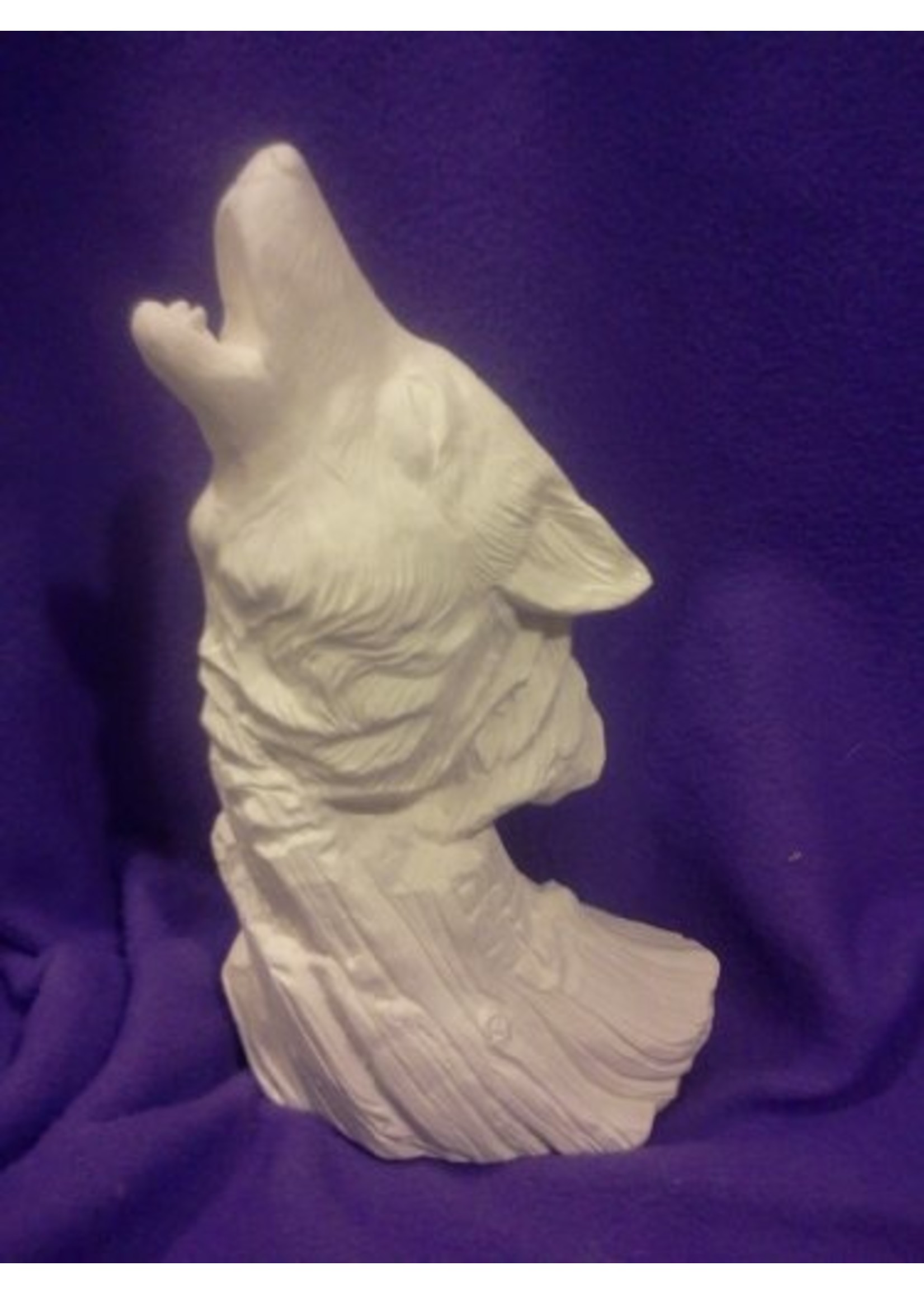 ceramic wolf statue