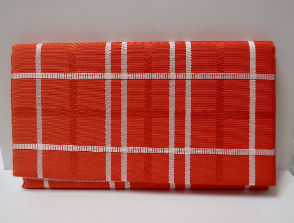 Leina Aonuma ORANGE/WHITE CRISS CROSS: OBI CLUTCH