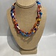 Beverly Creamer BAC4 - Triple strand multi-color spring mix with Venetian glass, new African glass tribal beads, handmade paper beads from Colombia and Guyana, hand-made glass beads from artisans in Hawaii and the Mainland, and connections made from old vinyl records cut
