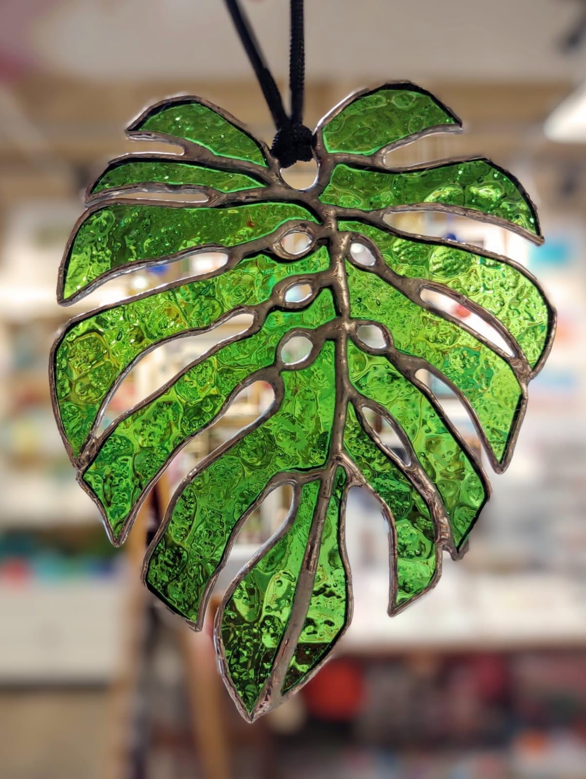 Clyde Oishi MONSTERA STAINED GLASS ORNAMENT, APPROX. 5"X4"
