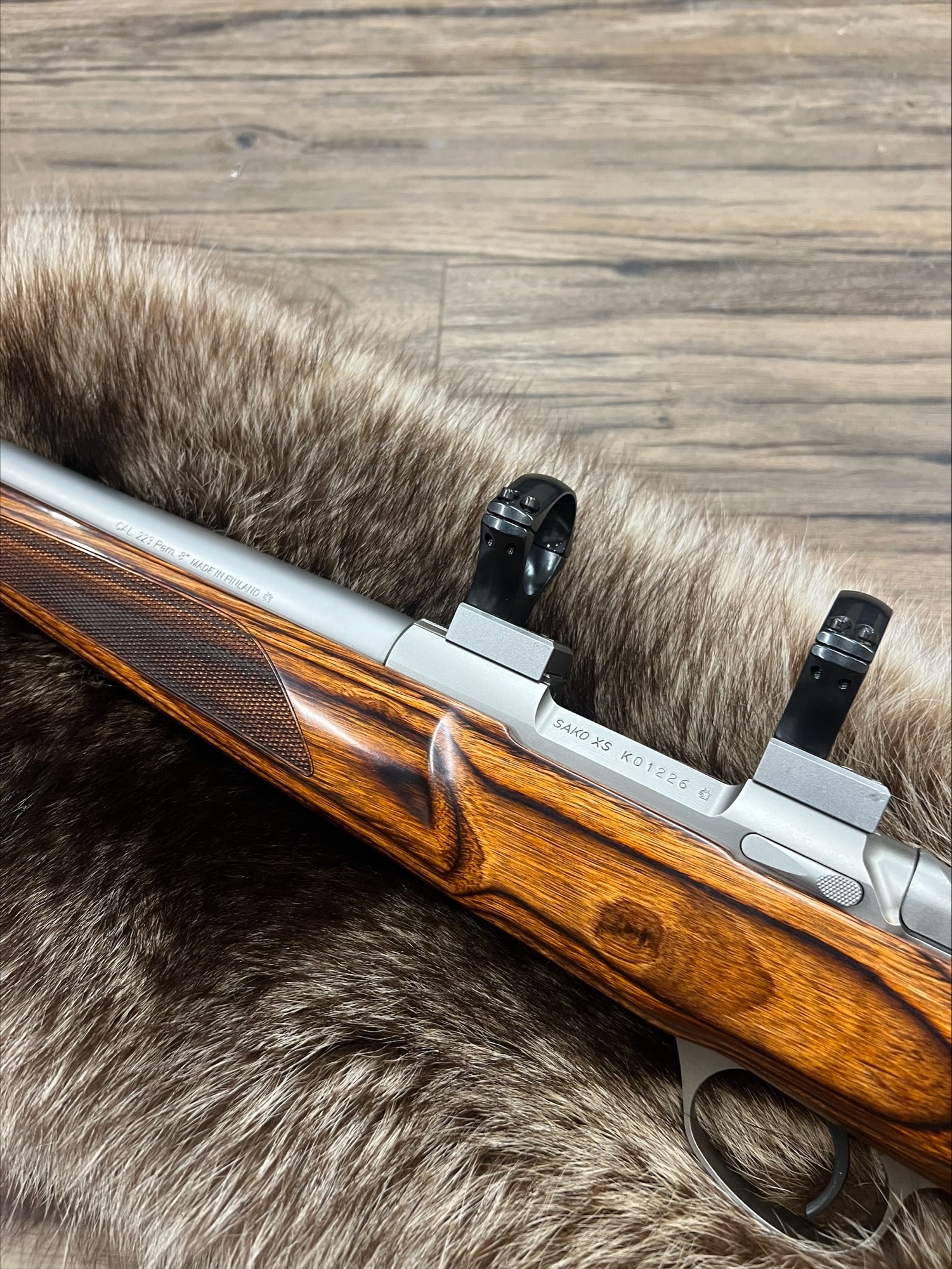 SAKO SAKO 85 VARMINT RIFLE, .223 REM, LAMINATE STOCK, STAINLESS STEEL, W/ RINGS, PRE-OWNED