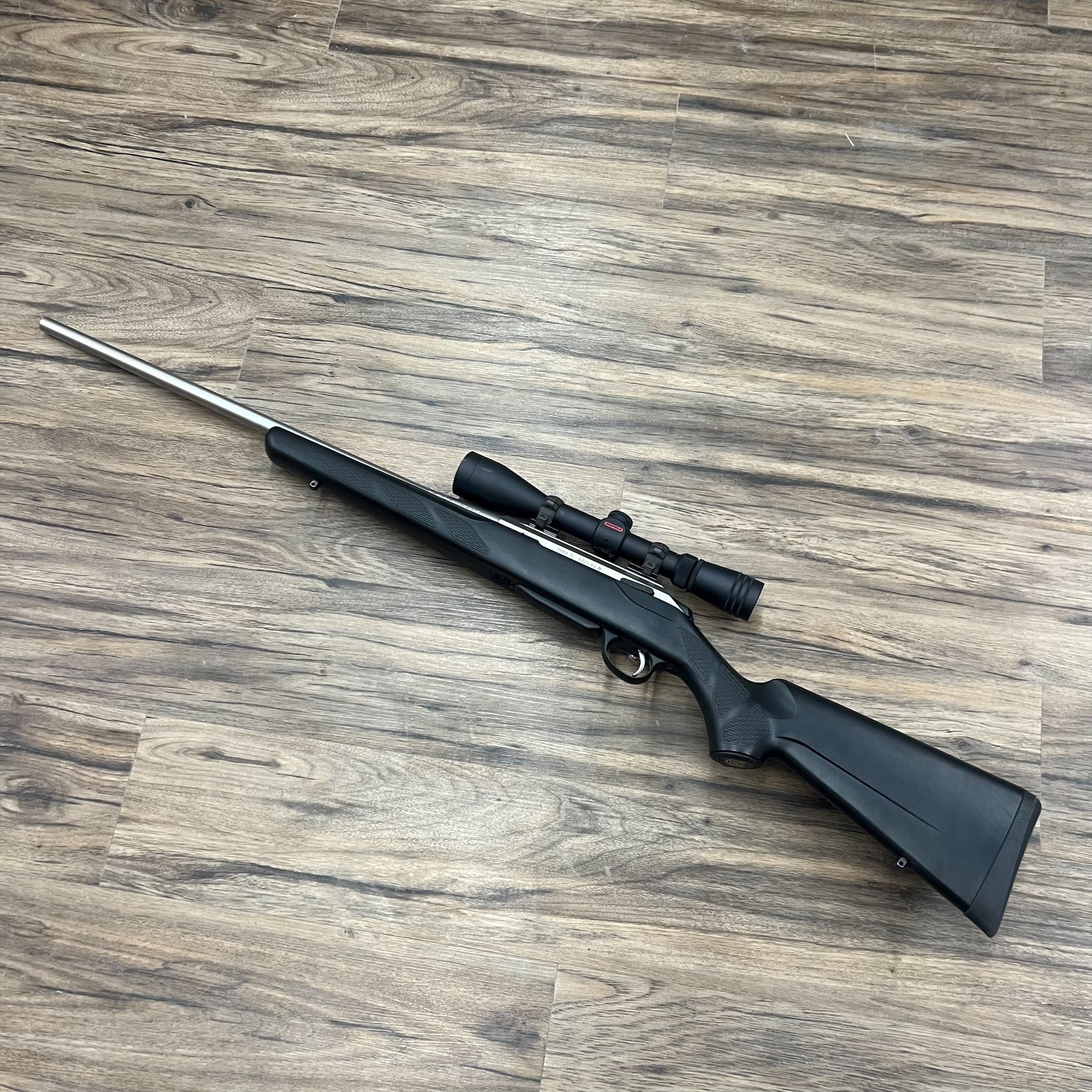 TIKKA TIKKA T3 RIFLE, .222 REM, STAINLESS, W/ REDFIELD SCOPE, PRE-OWNED