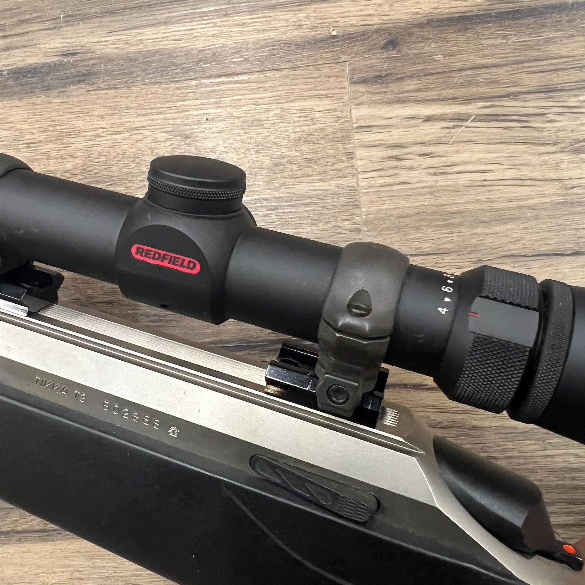 TIKKA TIKKA T3 RIFLE, .222 REM, STAINLESS, W/ REDFIELD SCOPE, PRE-OWNED