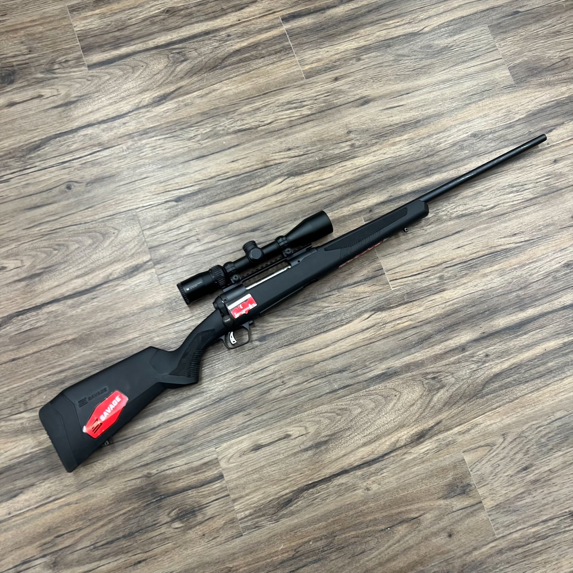 SAVAGE SAVAGE 110 APEX STORM XP RIFLE, 270 WIN, W/ VORTEX CROSSFIRE II SCOPE, PRE-OWNED