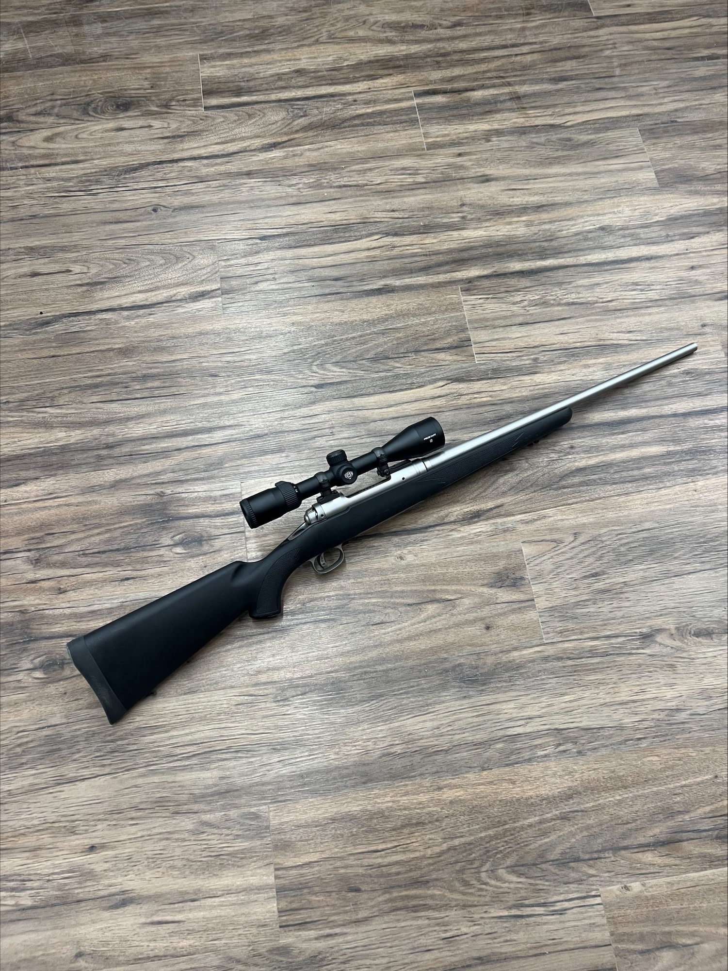 SAVAGE SAVAGE MODEL 16 RIFLE, .308 WIN, LEFT HAND, STAINLESS, W/ NIKON PROSTAFF RIFLESCOPE, PRE-OWNED