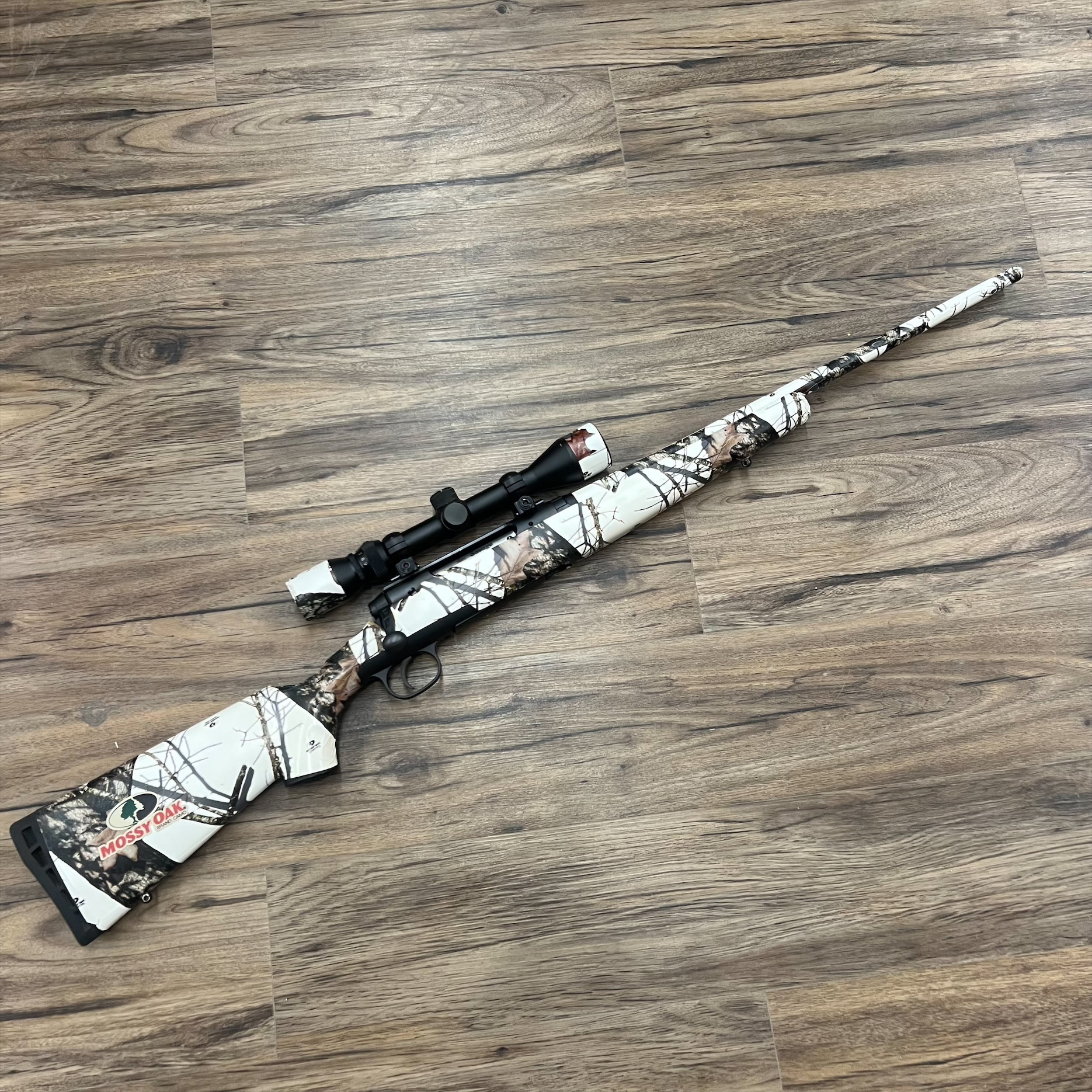 SAVAGE SAVAGE AXIS XP RIFLE, 30-06, W/ 3-9X40MM SCOPE, CAMO TAPE JOB, PRE-OWNED