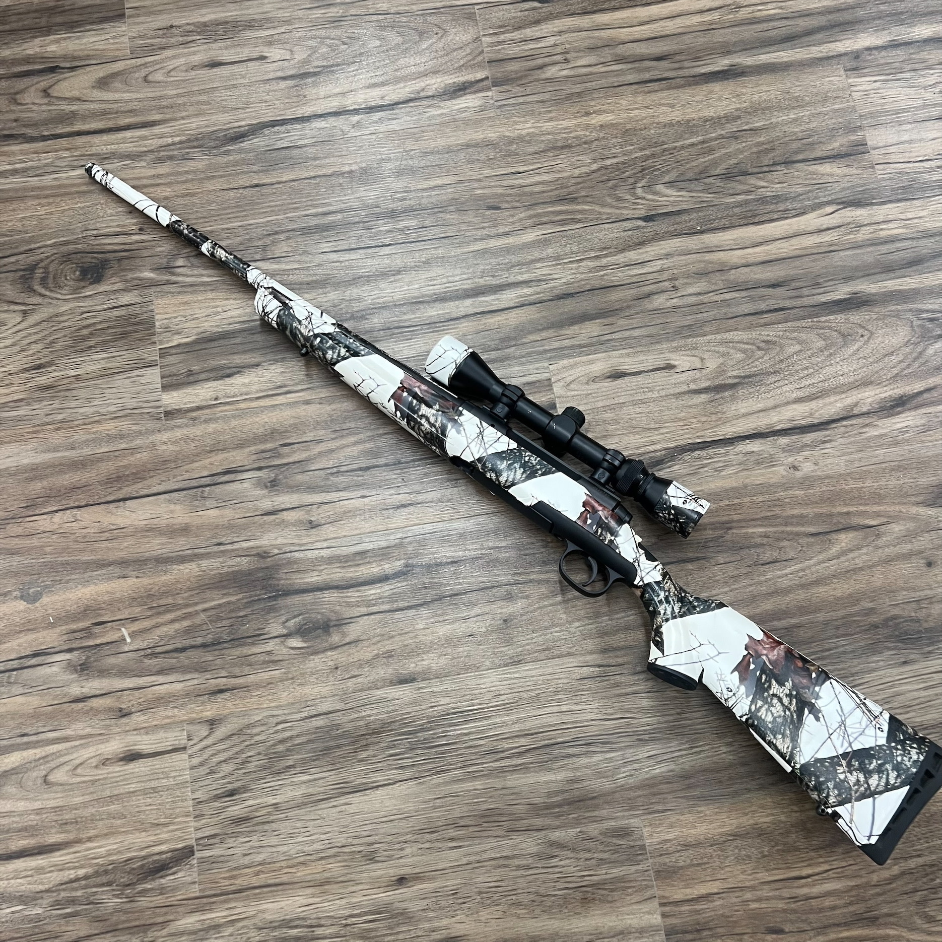 SAVAGE SAVAGE AXIS XP RIFLE, 30-06, W/ 3-9X40MM SCOPE, CAMO TAPE JOB, PRE-OWNED
