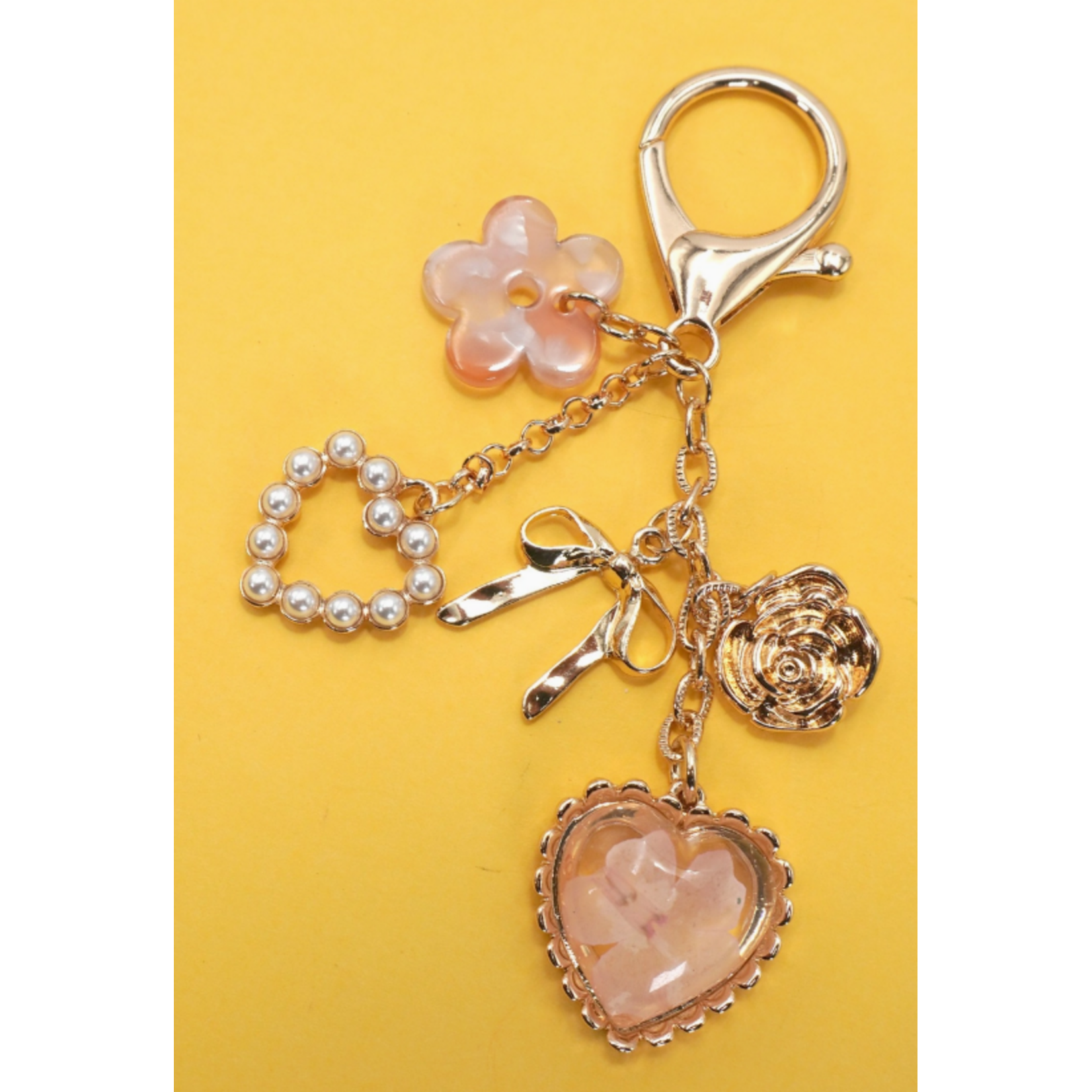 Josslyn Josslyn Pressed Flower Bow Pearl Heart Bag Charm Gold