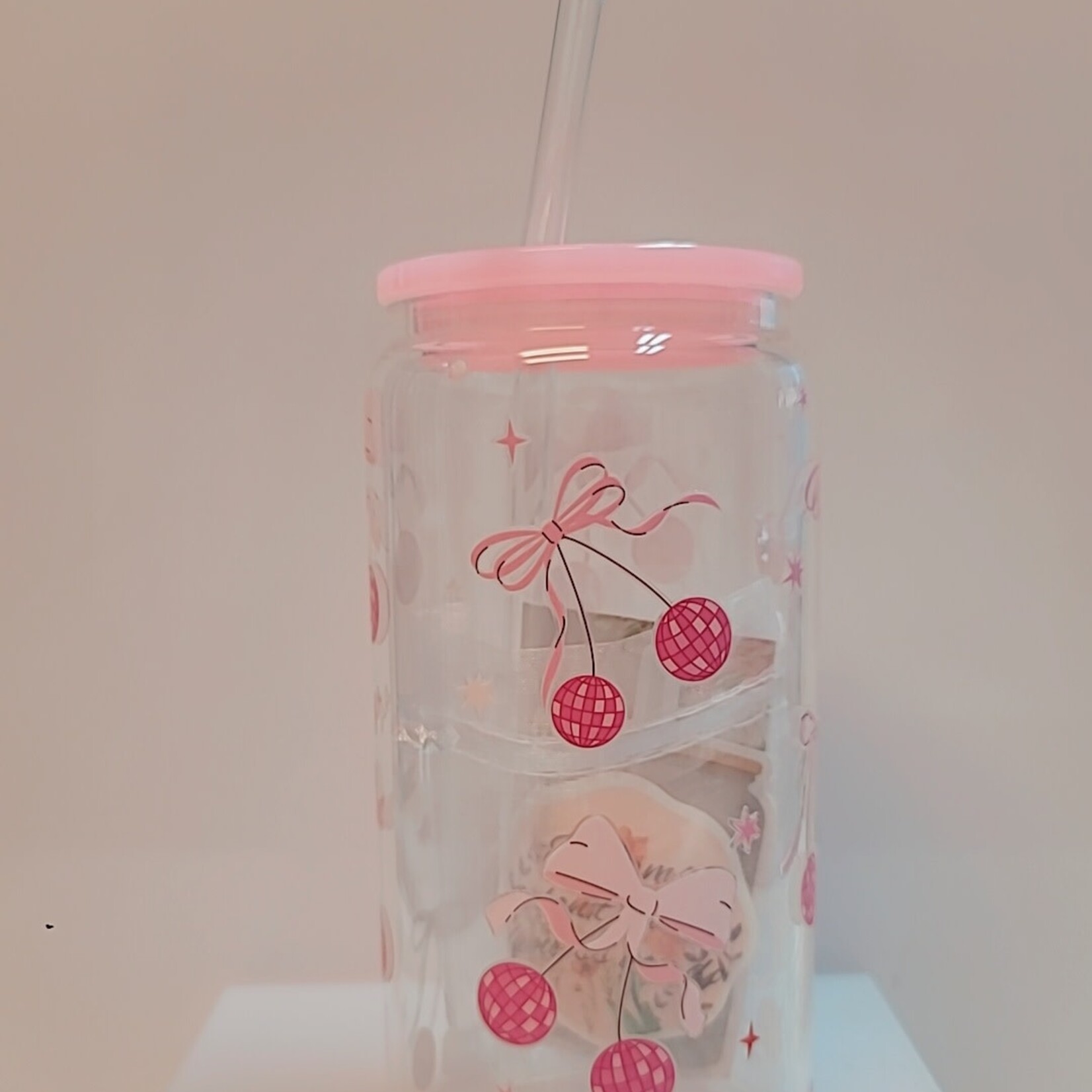 1023 | GRACE'S|PINK GLASS CUP 16 OZ.- Bows/Disco Balls