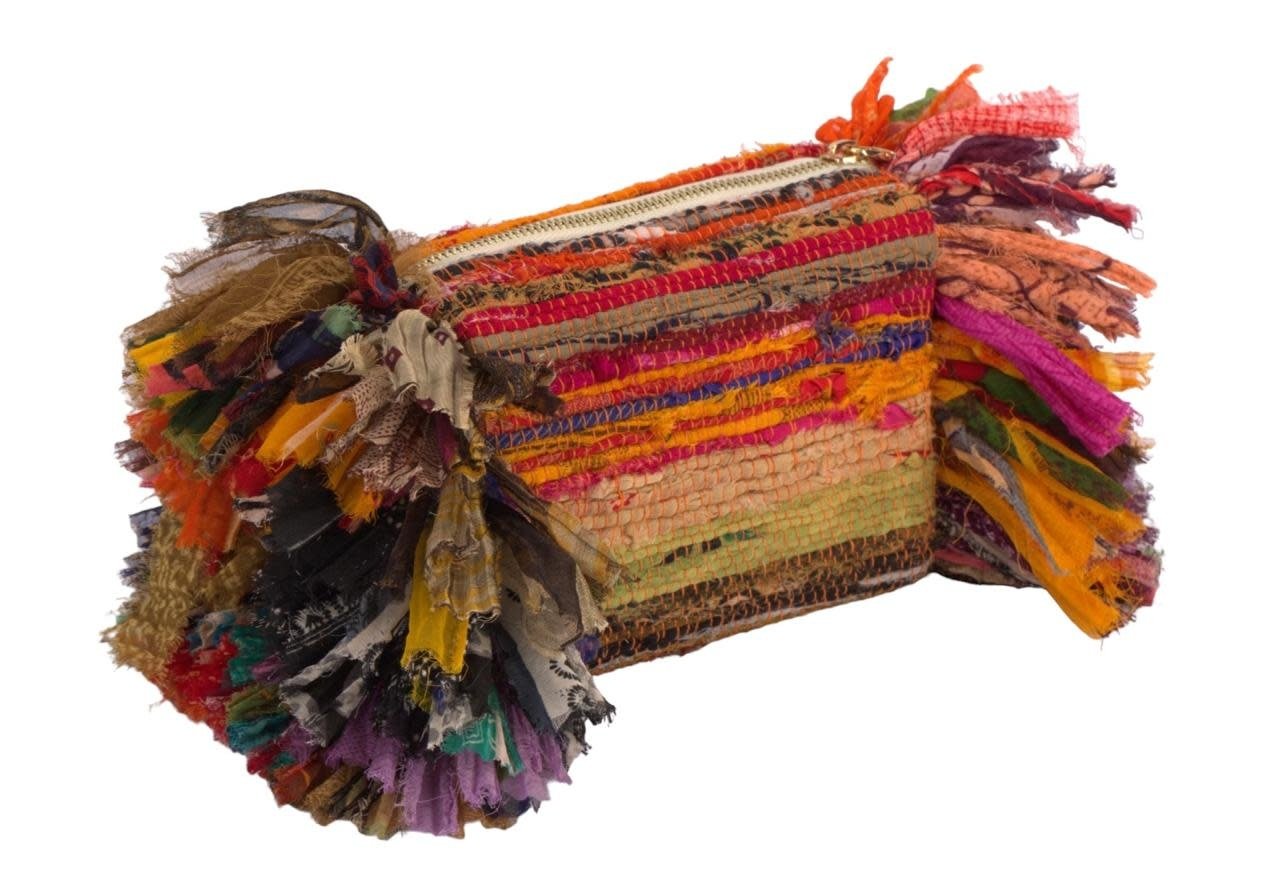 BASMA COLLECTION Multicolor fringe clutch bag made out of upcycled fabric handwoven on wooden looms