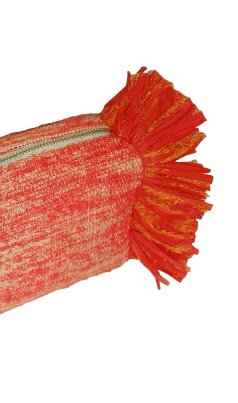 BASMA COLLECTION Orange fringe clutch made out of upcyled fabric handwoven on wooden looms