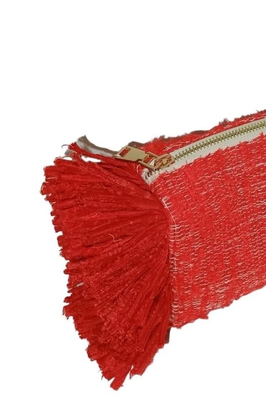 BASMA COLLECTION Red fringe clutch made out of upcycled fabric handwoven on wooden looms