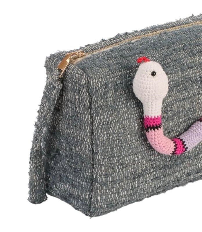 BASMA COLLECTION Light blue clutch made out of upcycled fabric handwoven on wooden looms with pastel crochet snake