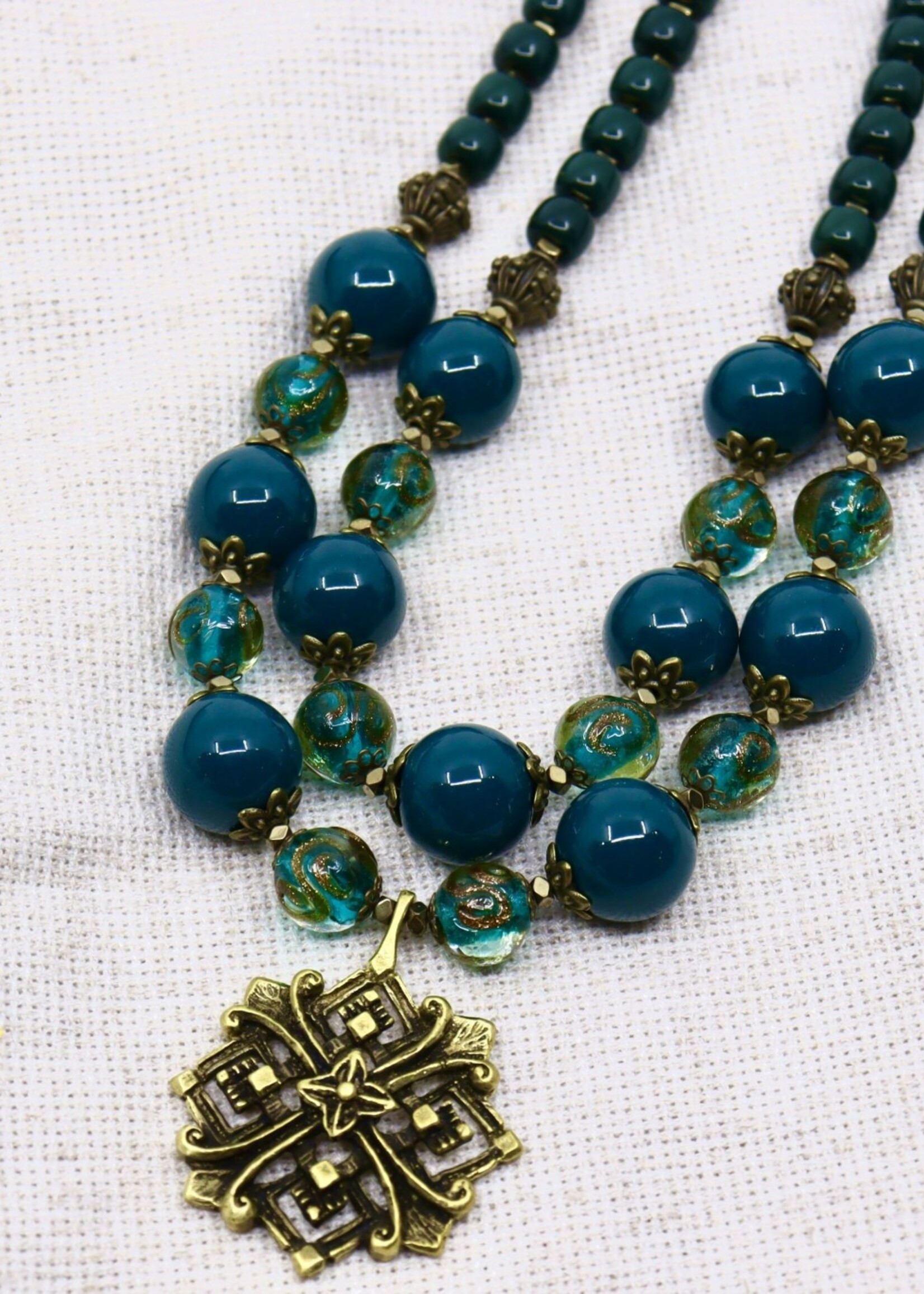JEWELRY -  Ethnic  Necklace " Misterious Bloom" in two line of Green  Murano Glass  beads with Brass pendant, Handcraft by Oksana Boriychuk