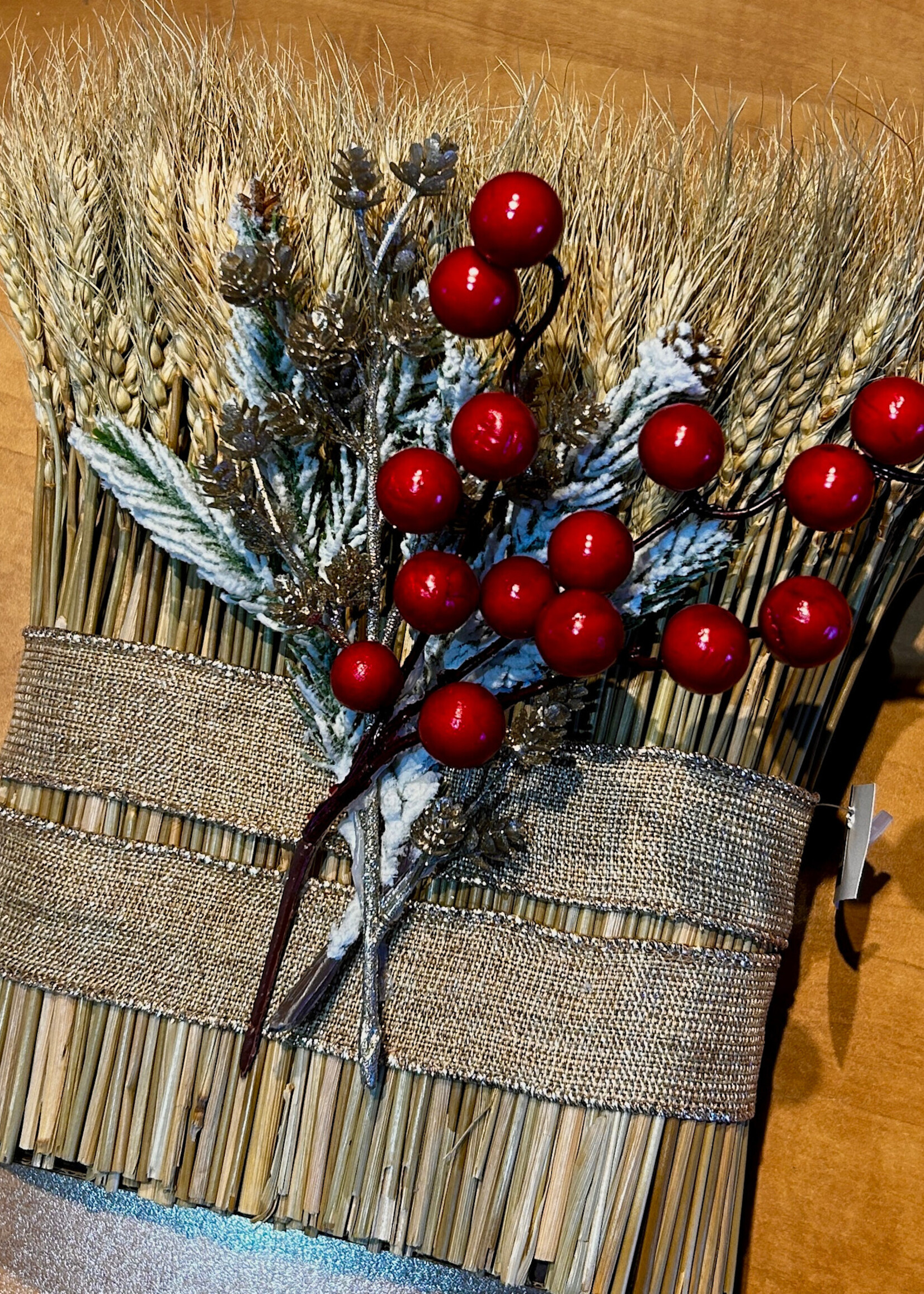 DECOR - Ukrainian Didukh Oblong Shaped Dried   Wheat Bouquet festively adorned with sage gold ribbon, pine bows and pinecones.