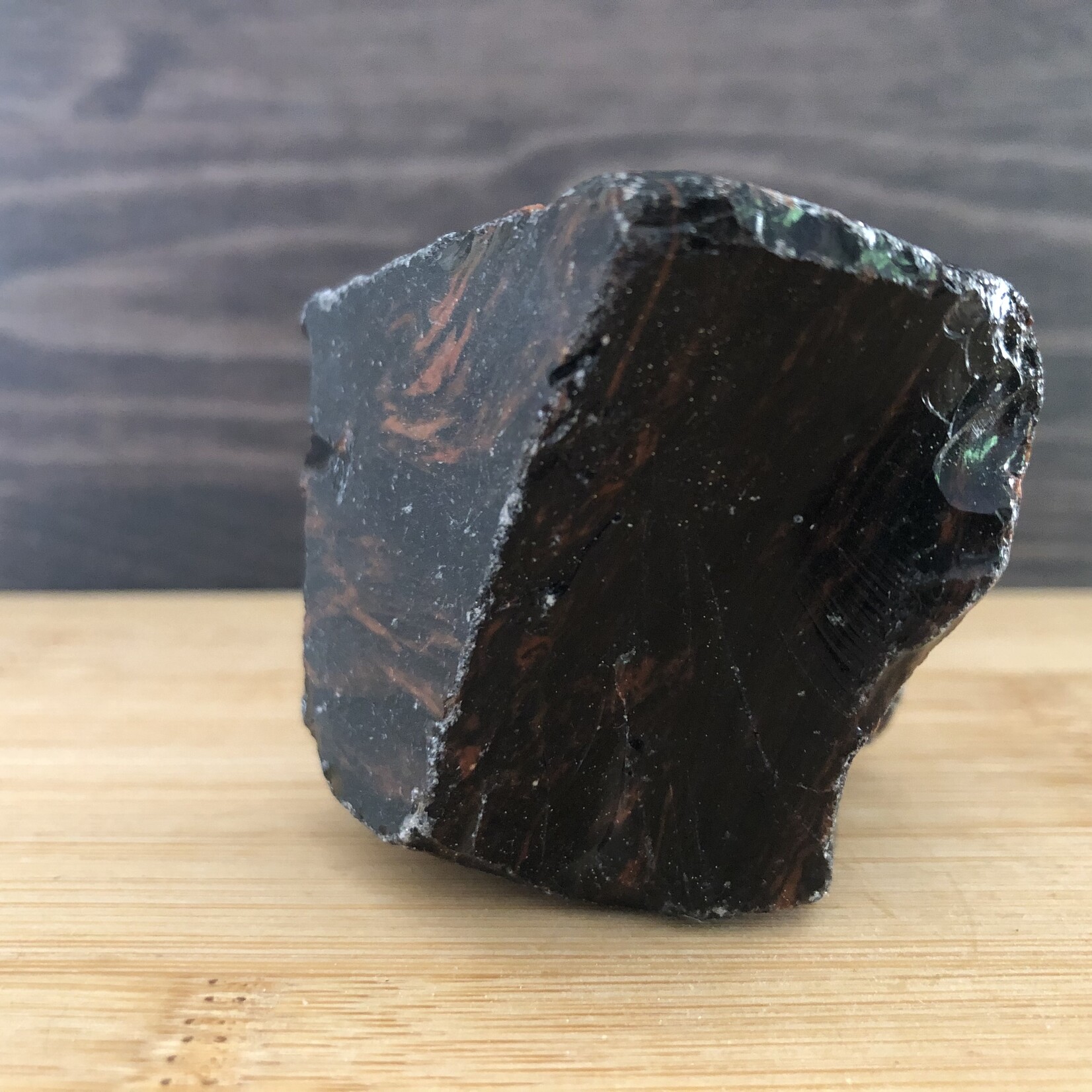 beautiful mahogany obsidian polished, used to relieve various types of pain such as muscle aches or cramps