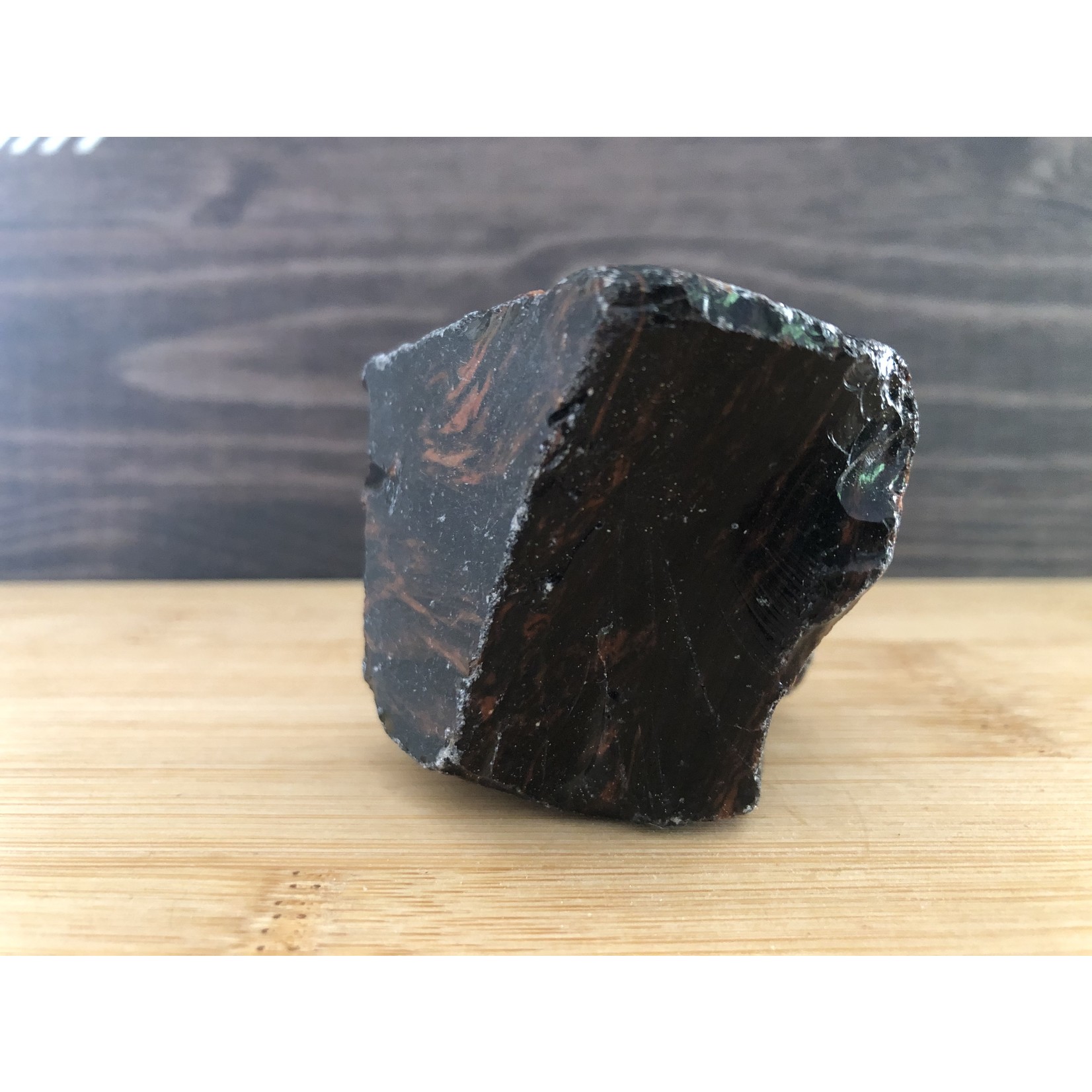beautiful mahogany obsidian polished, used to relieve various types of pain such as muscle aches or cramps