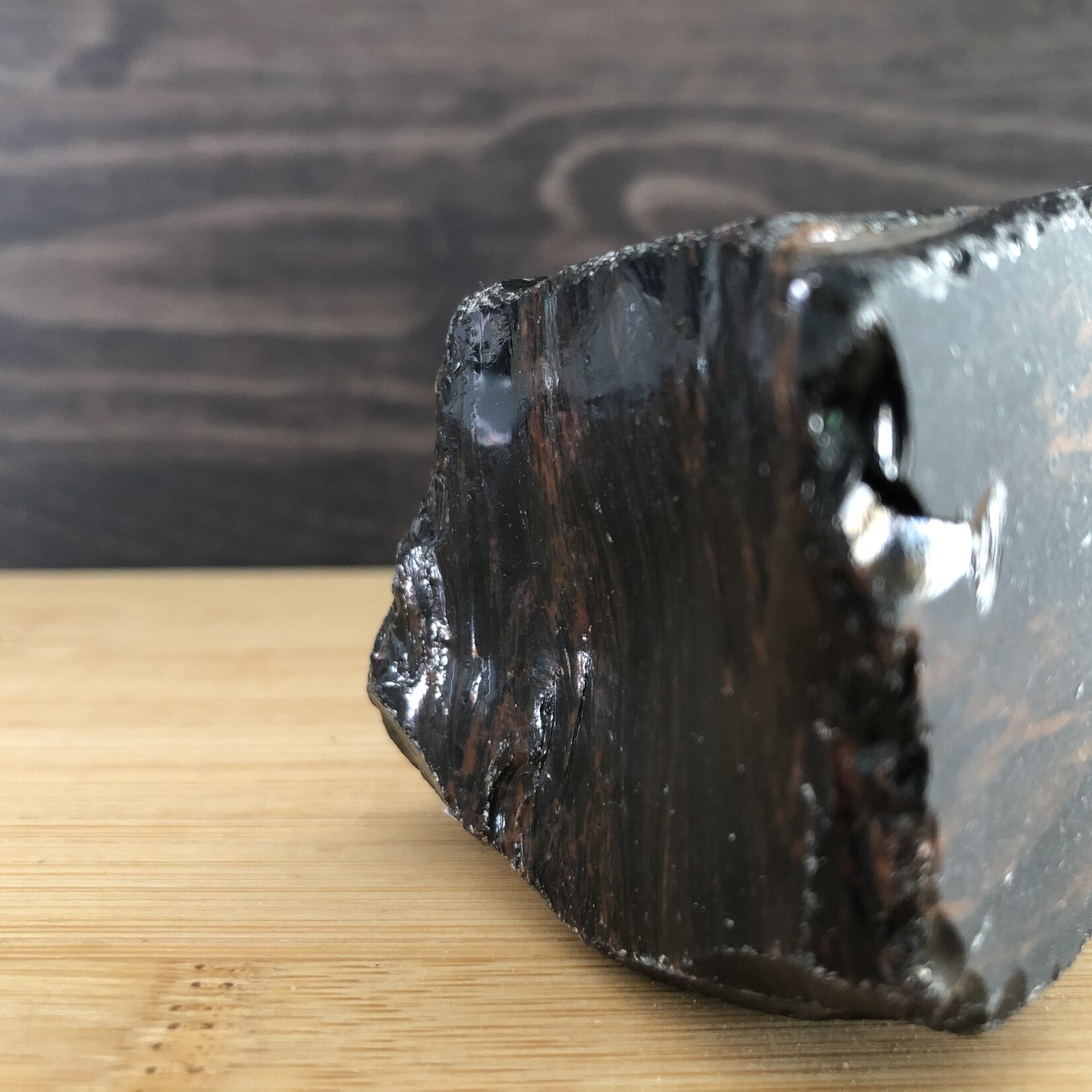 beautiful mahogany obsidian polished, used to relieve various types of pain such as muscle aches or cramps