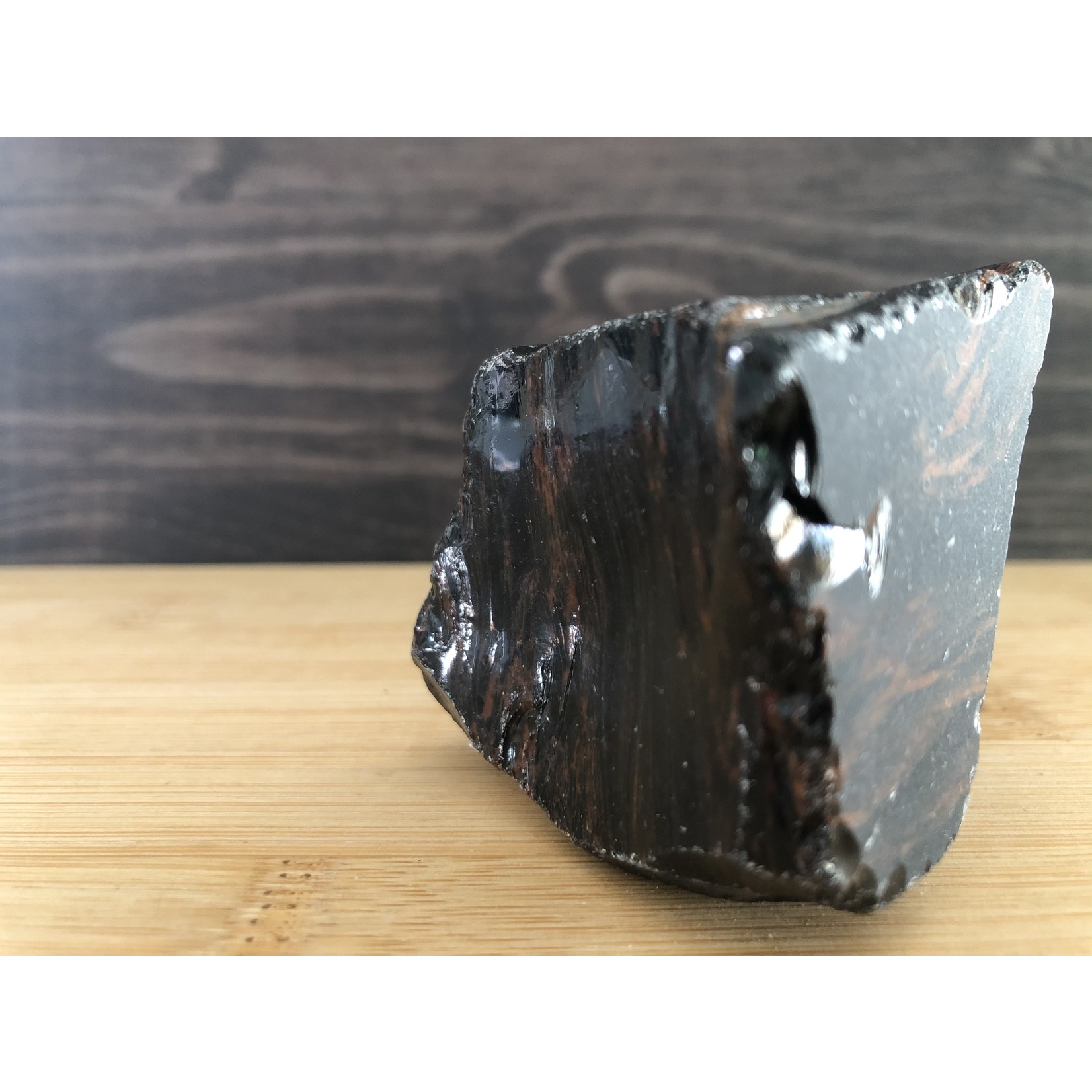 beautiful mahogany obsidian polished, used to relieve various types of pain such as muscle aches or cramps