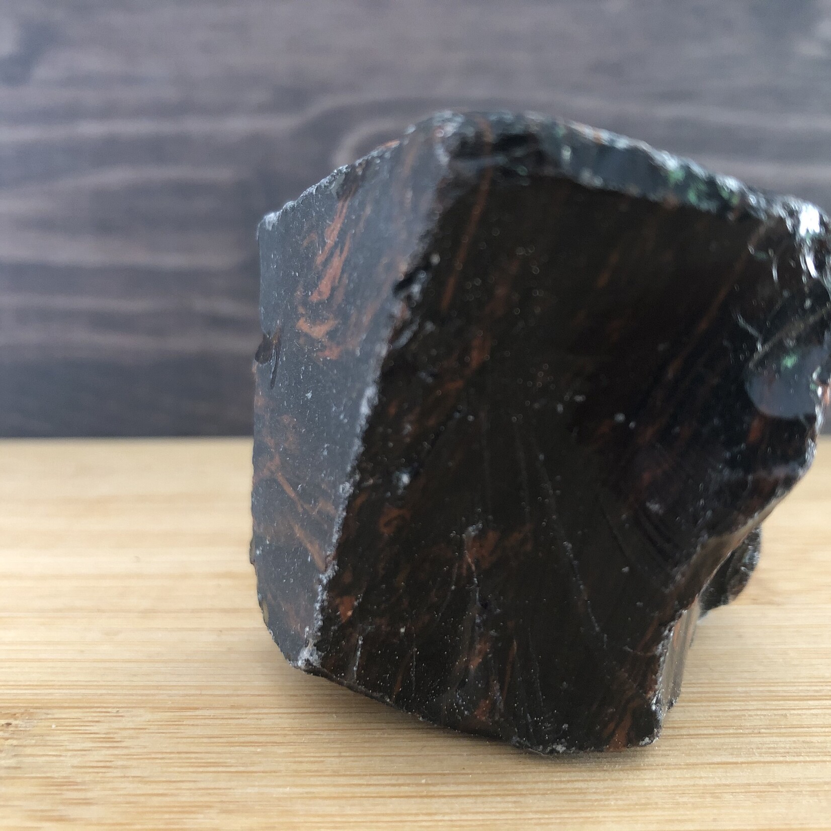 beautiful mahogany obsidian polished, used to relieve various types of pain such as muscle aches or cramps