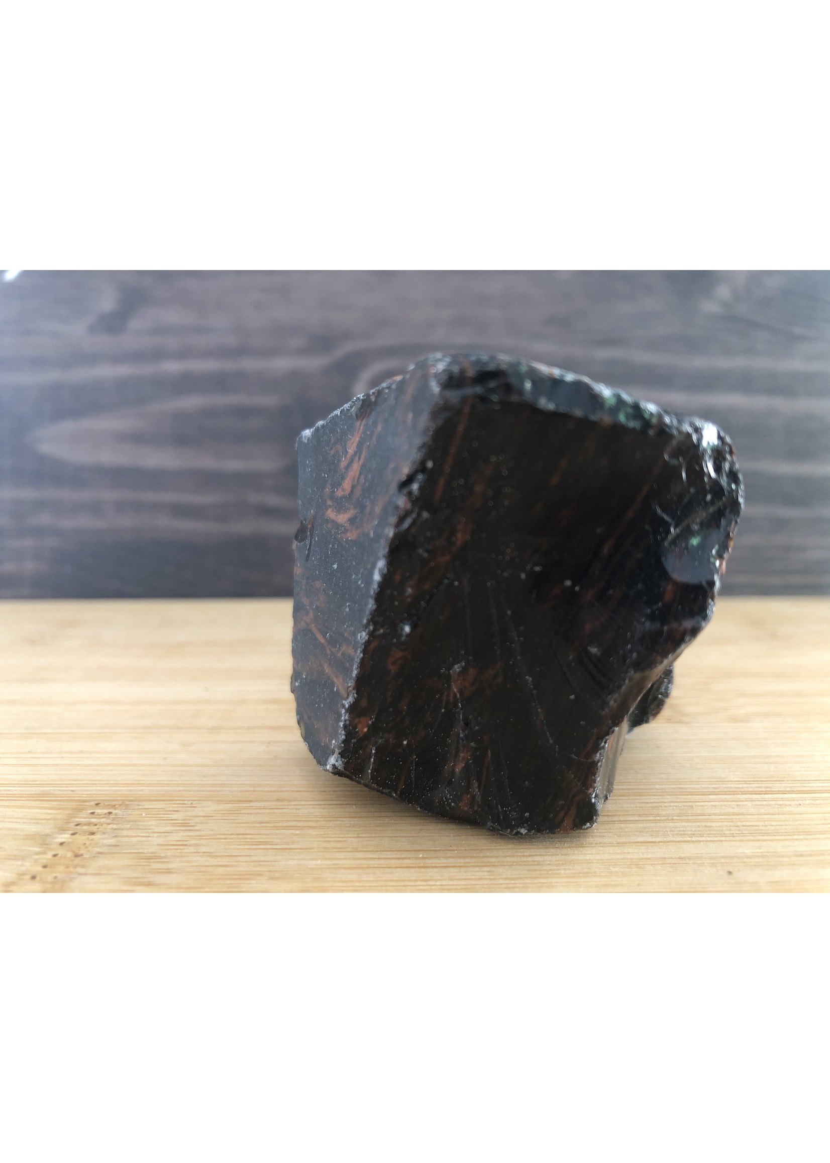 beautiful mahogany obsidian polished, used to relieve various types of pain such as muscle aches or cramps