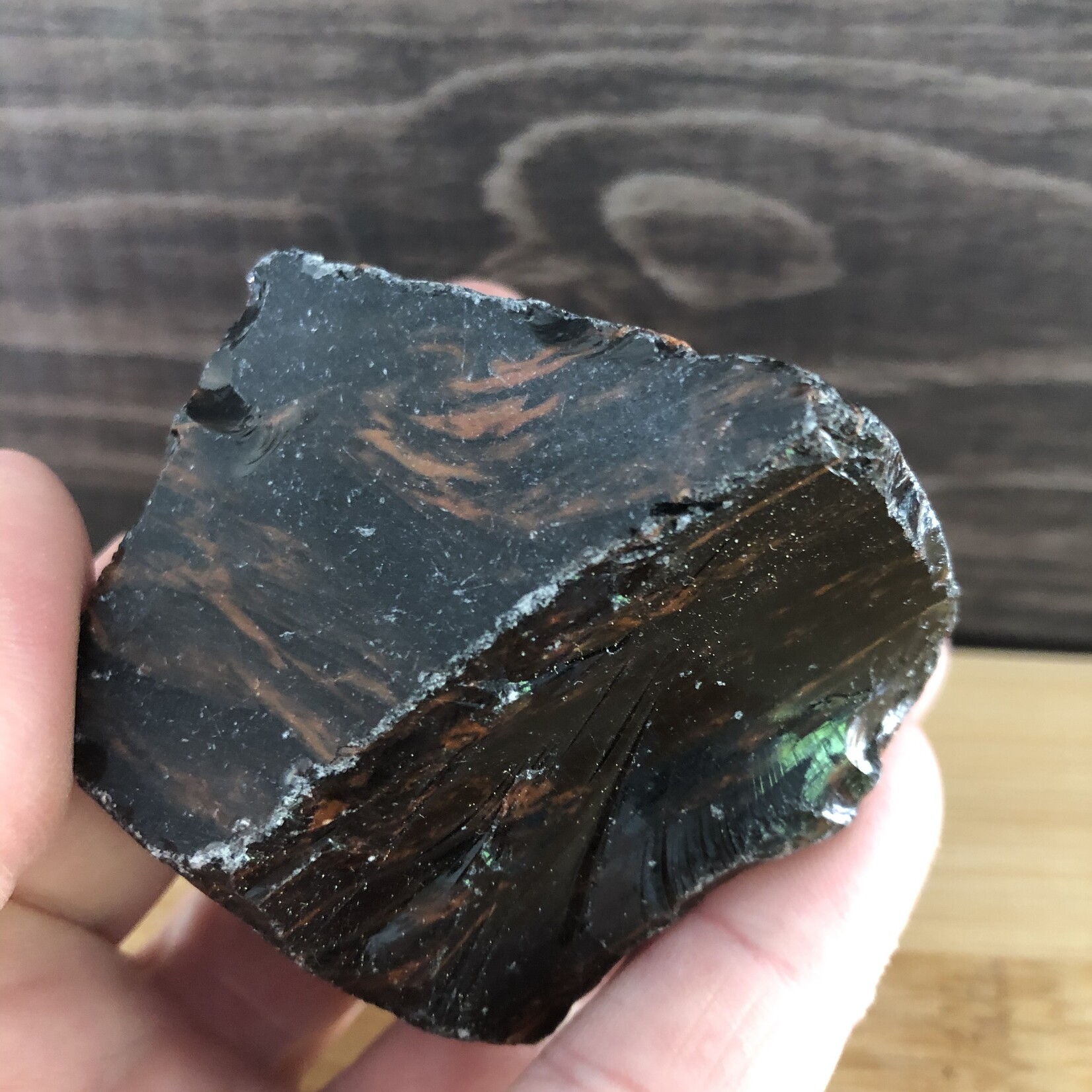 beautiful mahogany obsidian polished, used to relieve various types of pain such as muscle aches or cramps