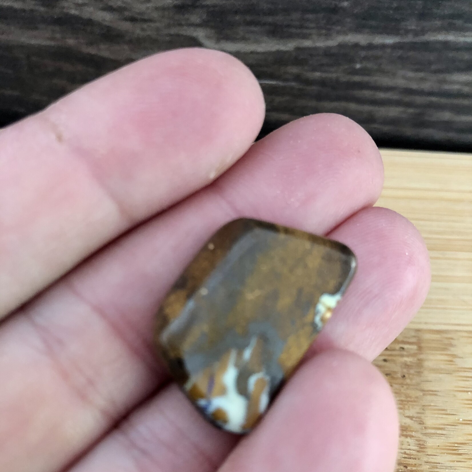 boulder opal palm stone