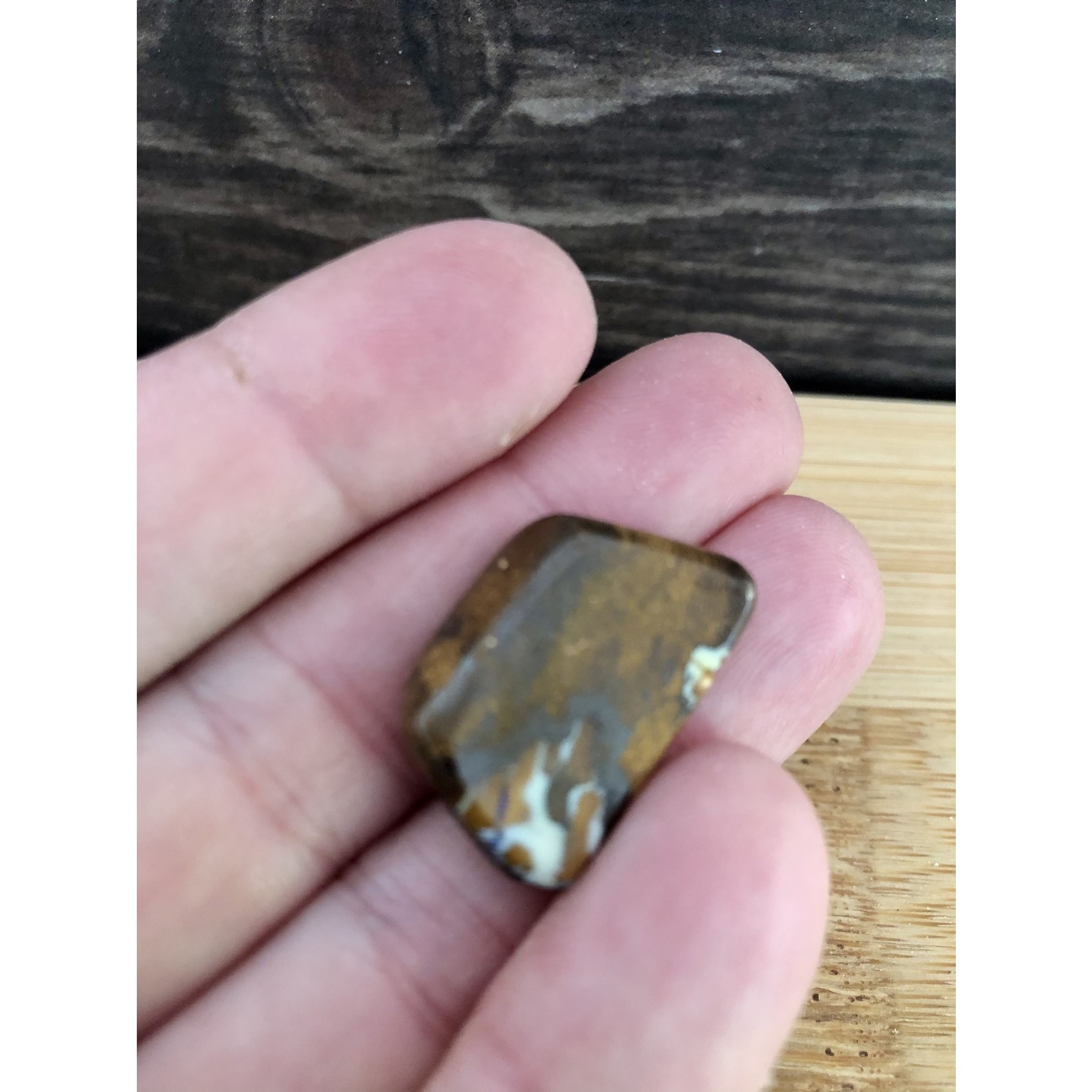 boulder opal palm stone