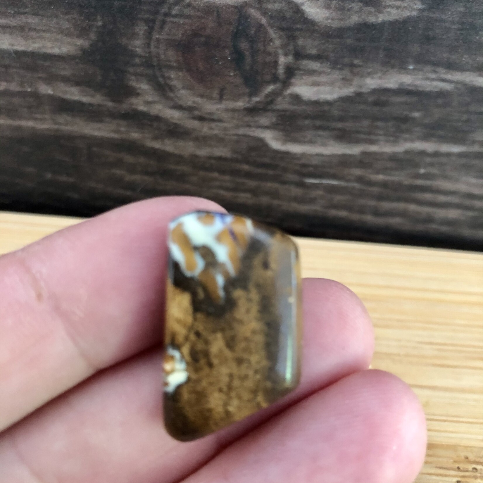 boulder opal palm stone