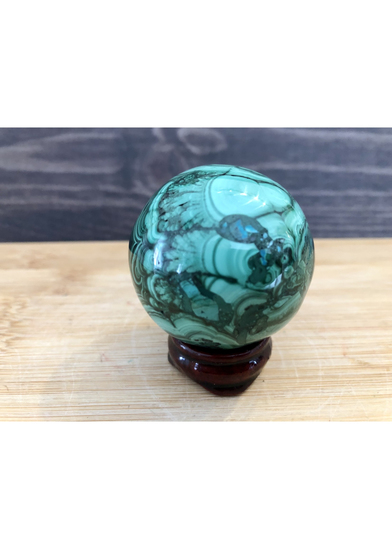 beautiful mirror malachite sphere, piece with a soft trace of chrysocolla