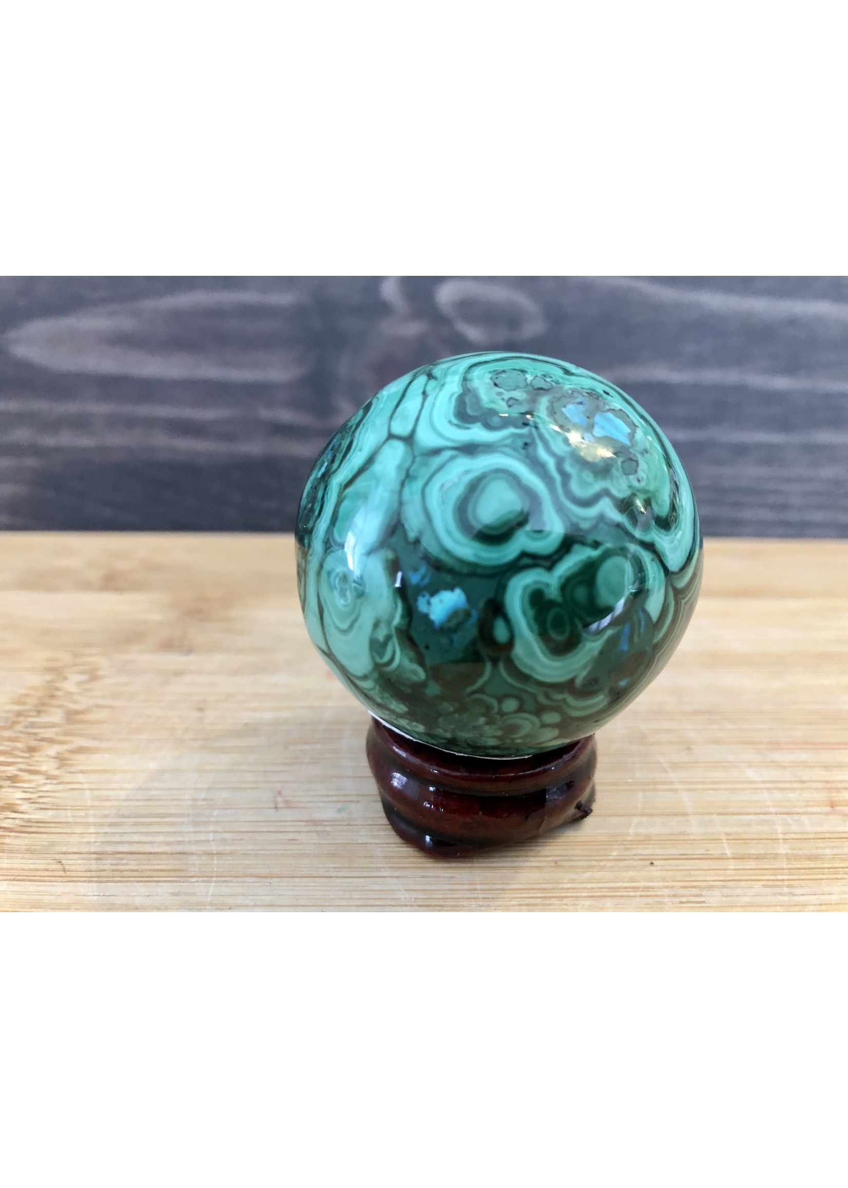 beautiful mirror malachite sphere, piece with a soft trace of chrysocolla