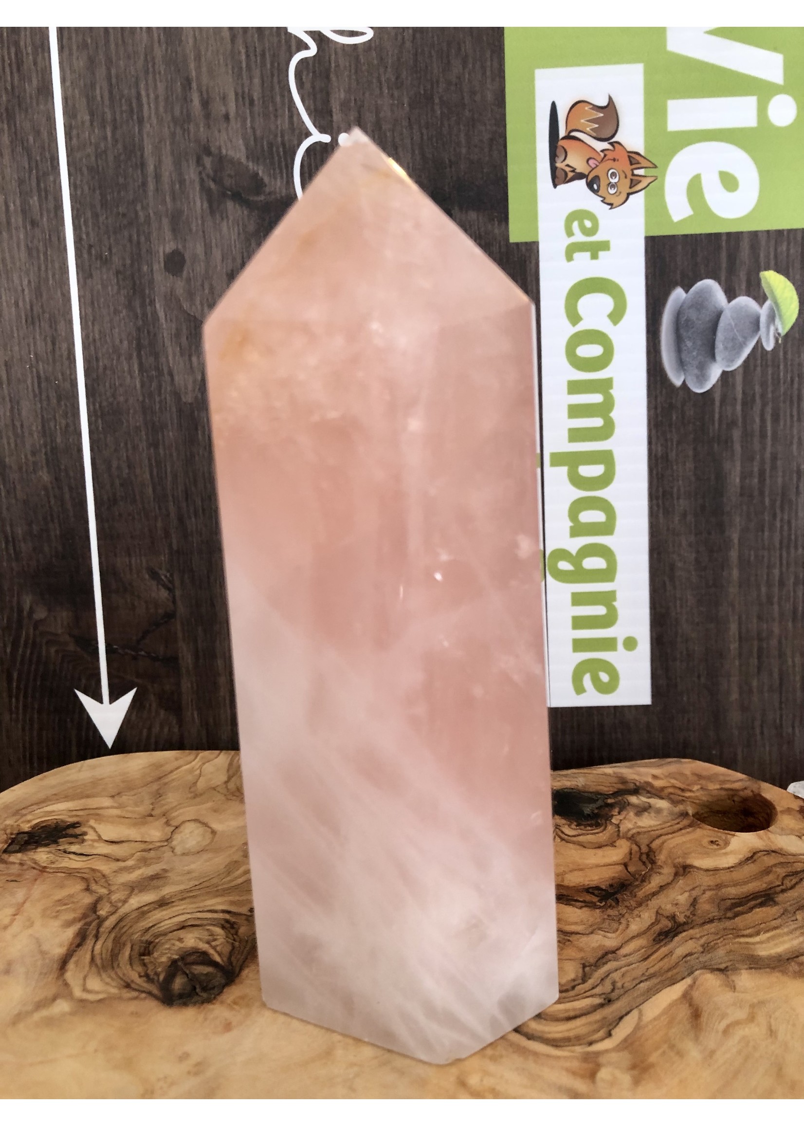 large tower rose quartz, pink crystal represented  universal love