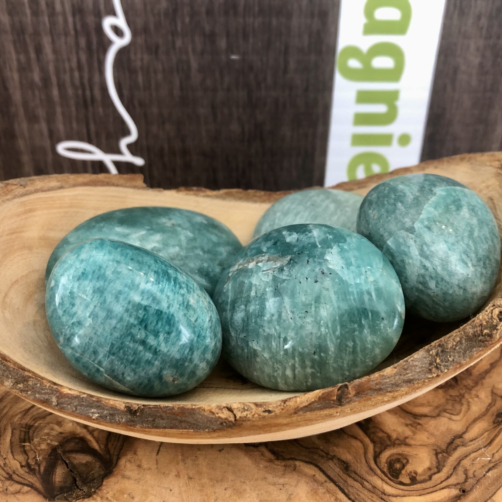 sparkling amazonite tumbled stone, perfect as a palm stone, exacerbates happiness and promotes love, compassion and forgiveness