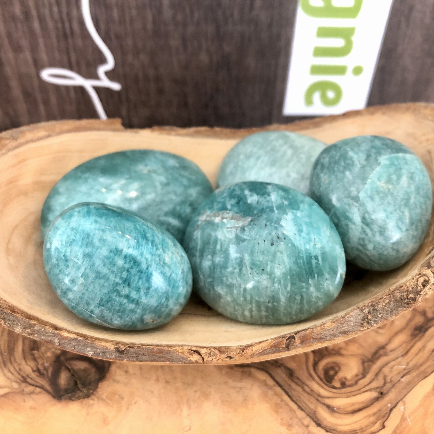sparkling amazonite tumbled stone, perfect as a palm stone, exacerbates happiness and promotes love, compassion and forgiveness