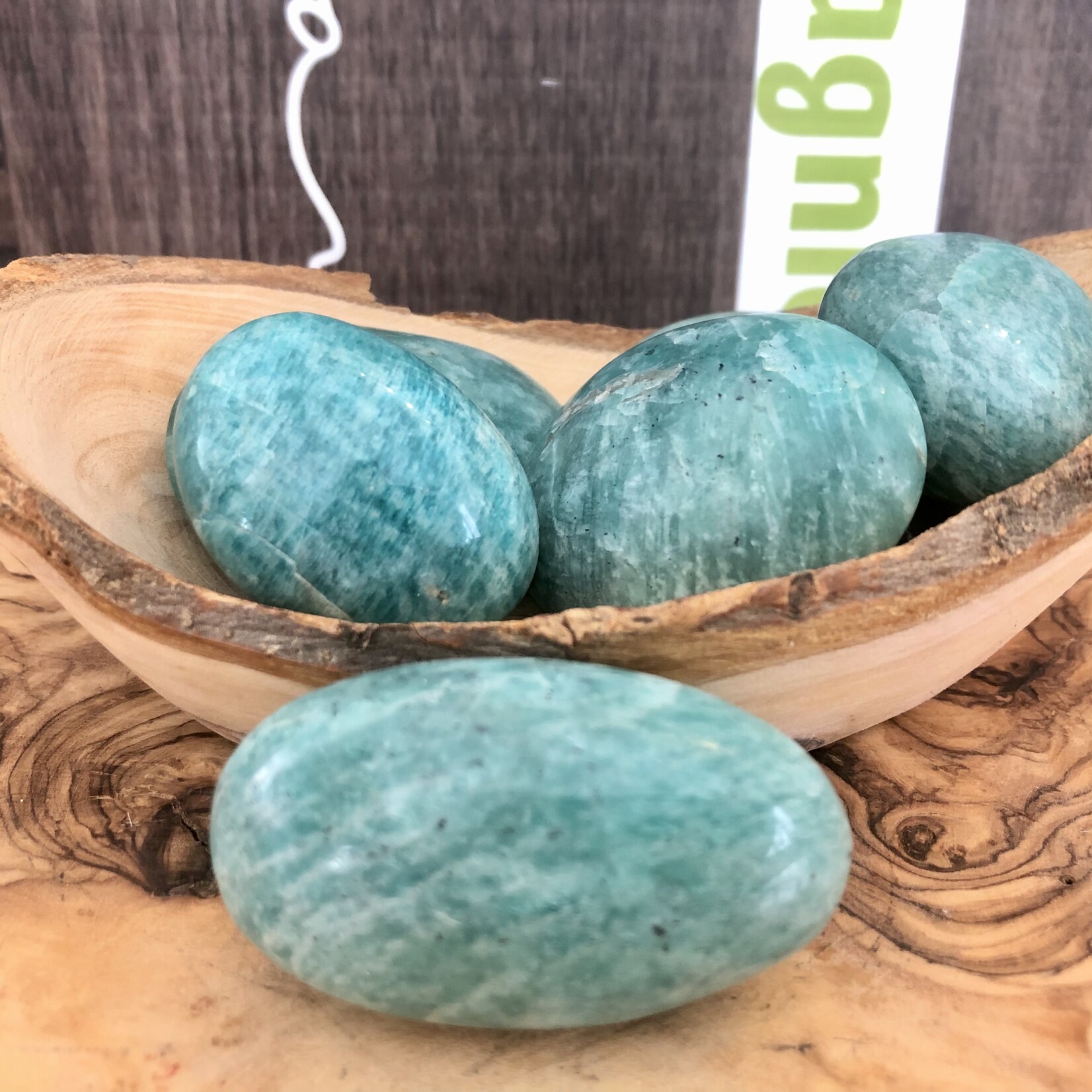 sparkling amazonite tumbled stone, perfect as a palm stone, exacerbates happiness and promotes love, compassion and forgiveness