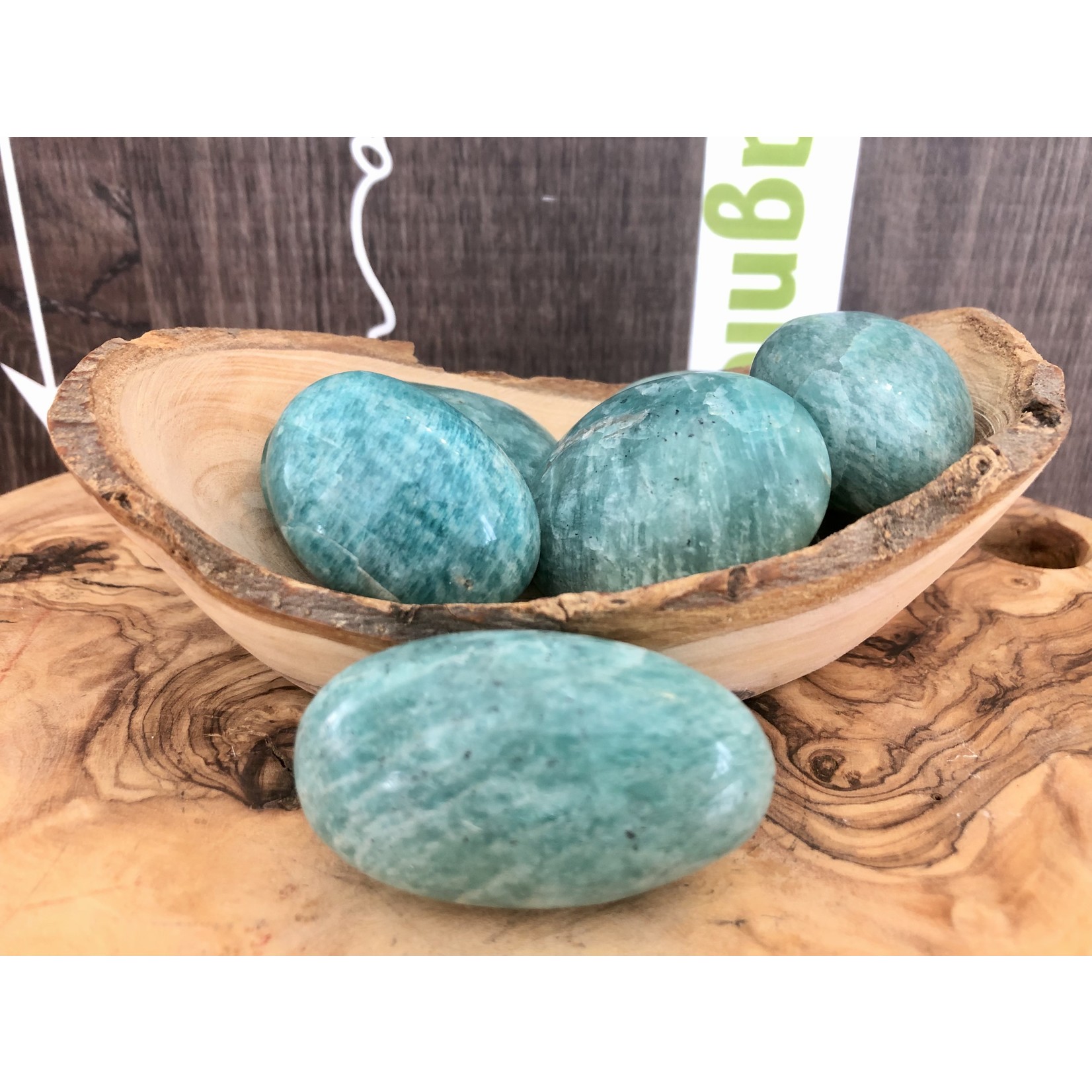 sparkling amazonite tumbled stone, perfect as a palm stone, exacerbates happiness and promotes love, compassion and forgiveness