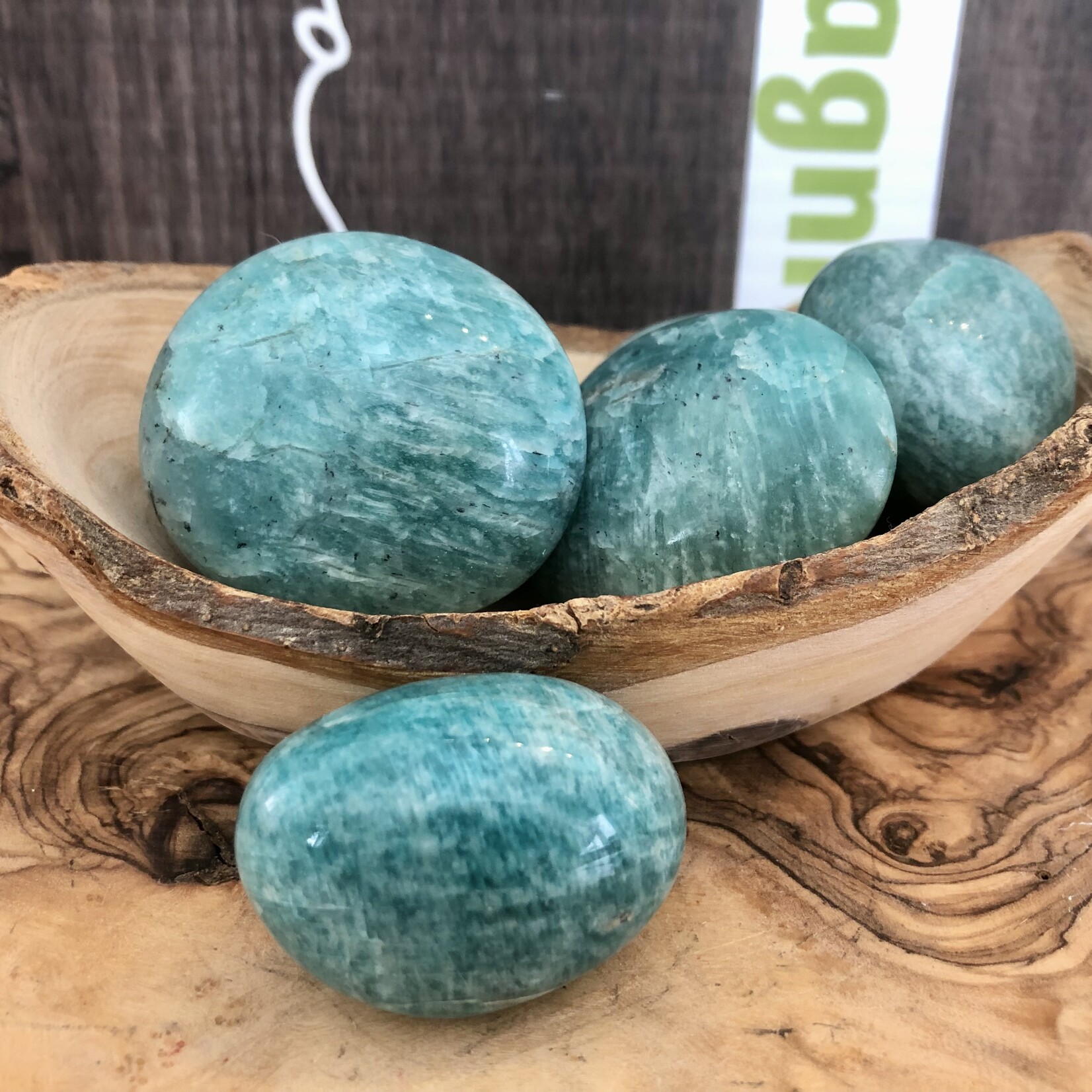 sparkling amazonite tumbled stone, perfect as a palm stone, exacerbates happiness and promotes love, compassion and forgiveness