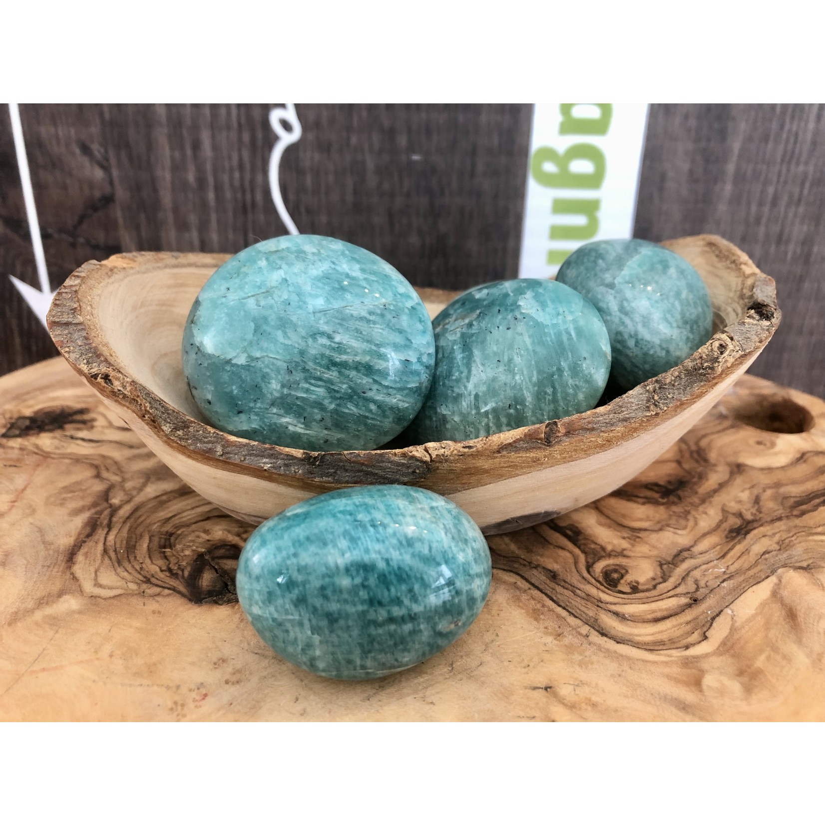 sparkling amazonite tumbled stone, perfect as a palm stone, exacerbates happiness and promotes love, compassion and forgiveness