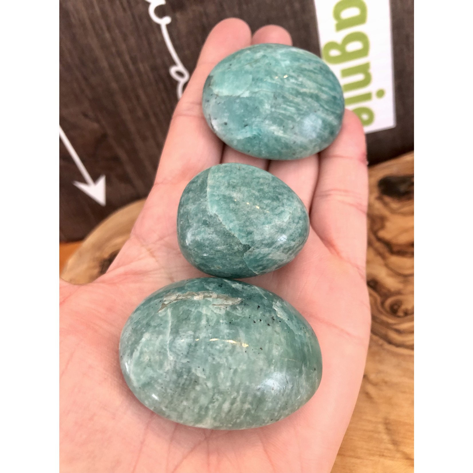 sparkling amazonite tumbled stone, perfect as a palm stone, exacerbates happiness and promotes love, compassion and forgiveness