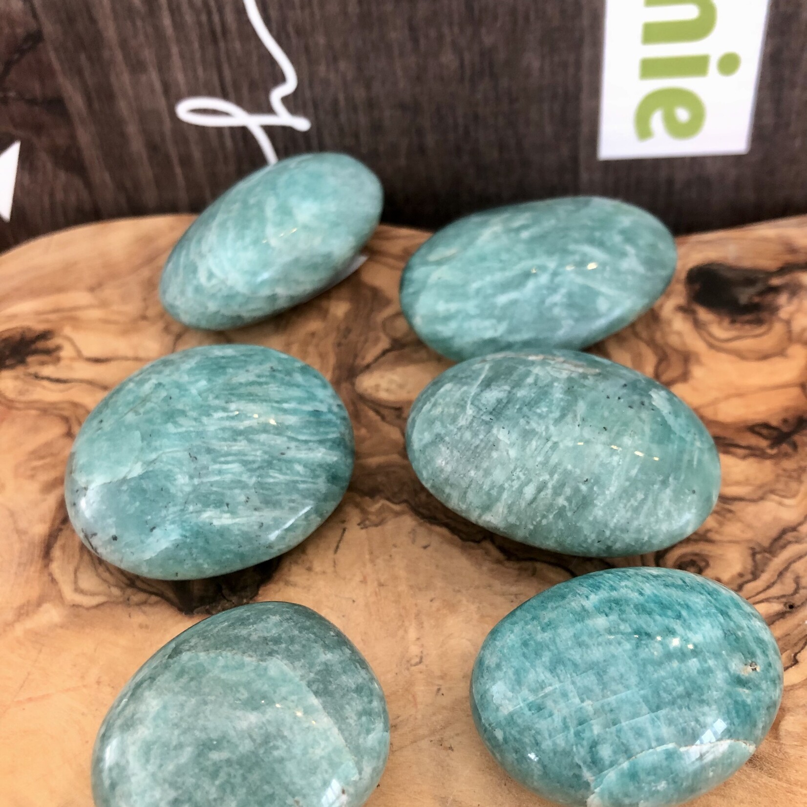 sparkling amazonite tumbled stone, perfect as a palm stone, exacerbates happiness and promotes love, compassion and forgiveness